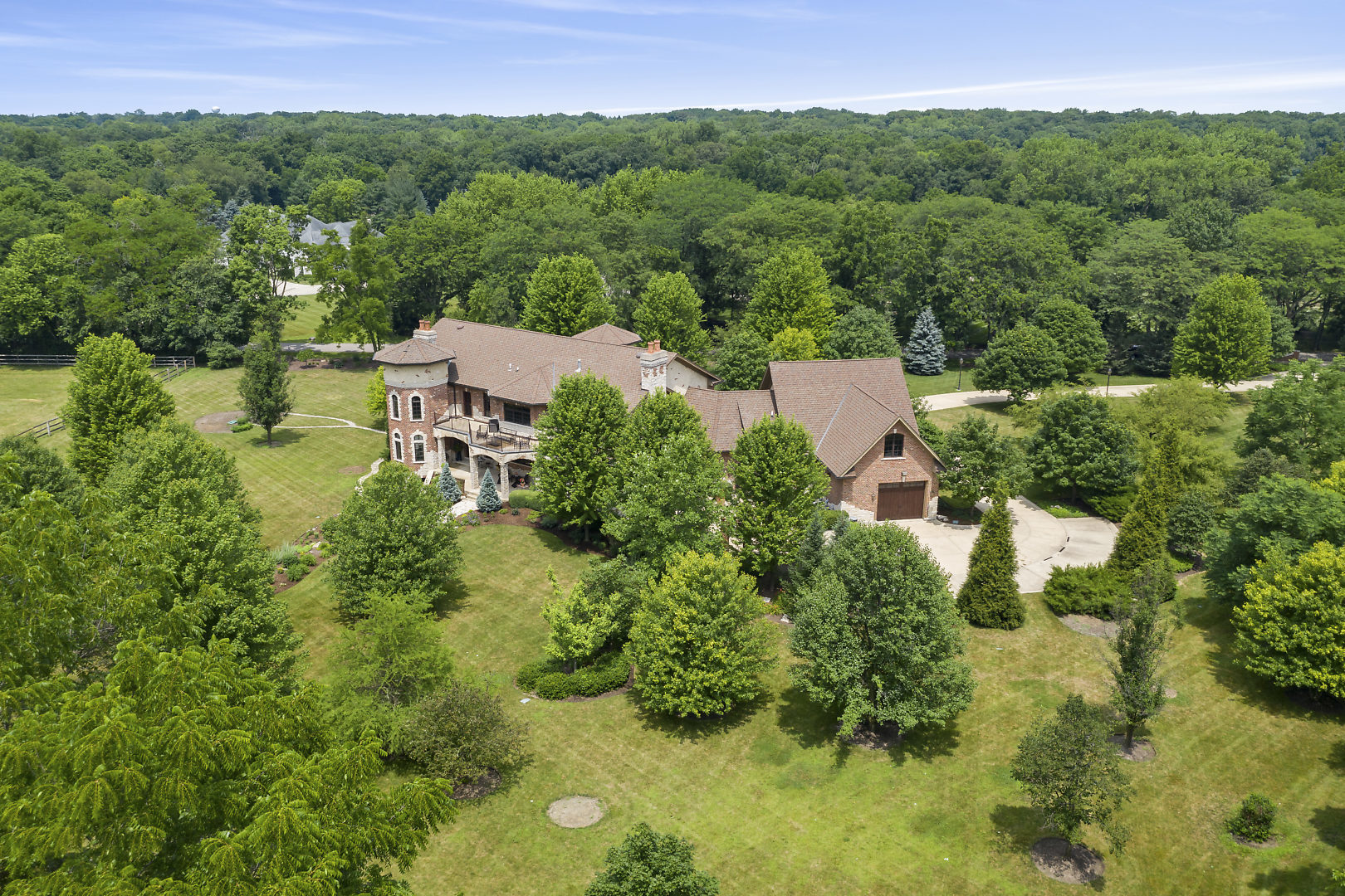 33W571 White Thorne Road St. Charles, IL 60174 - Photo 40 of 46 an aerial view of a house with yard and outdoor seating