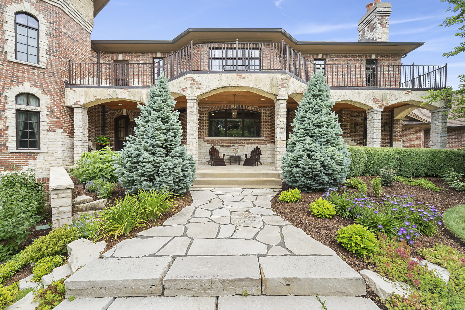 33W571 White Thorne Road St. Charles, IL 60174 - Photo 41 of 46 a front view of a house with a garden