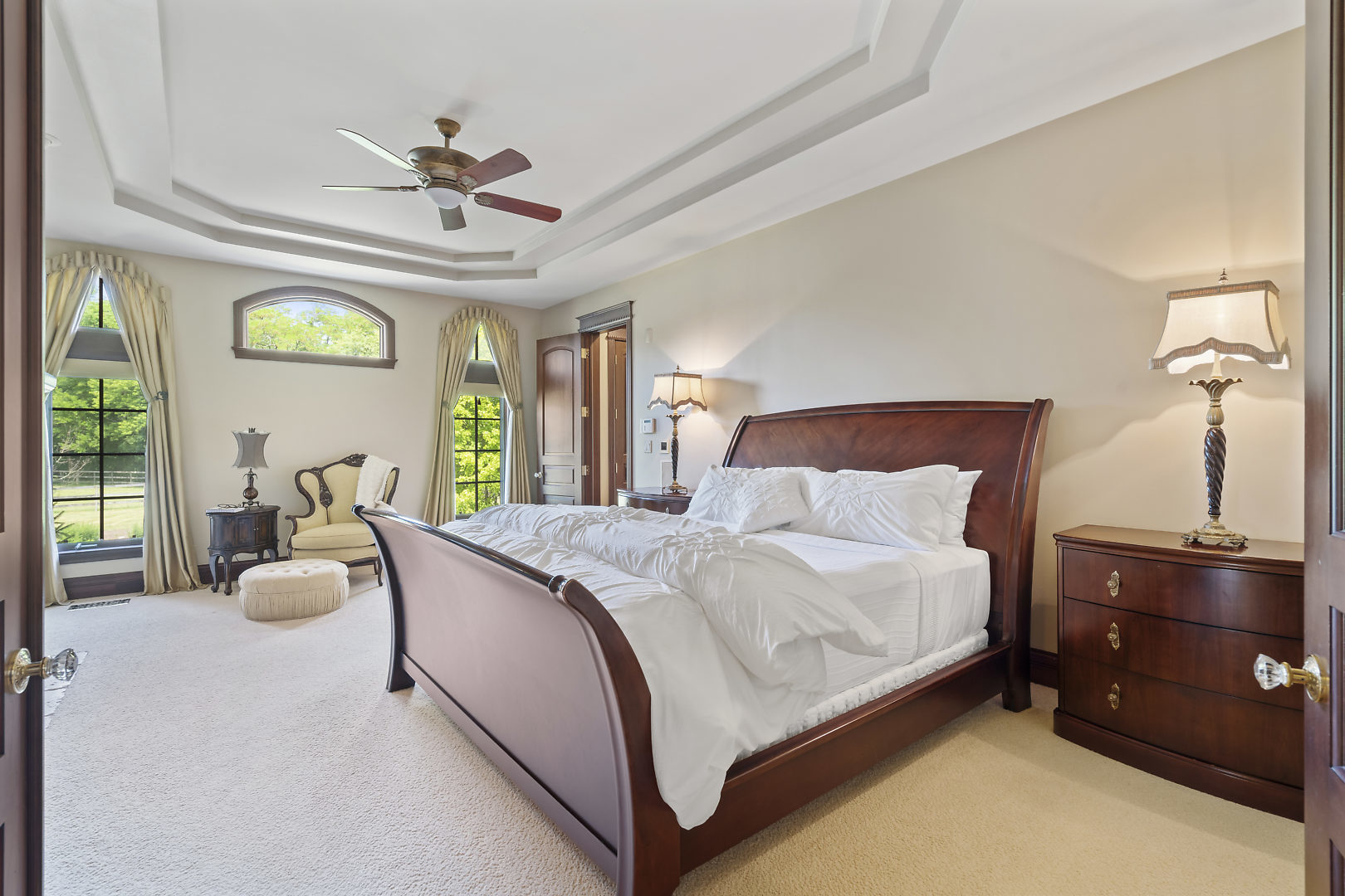 33W571 White Thorne Road St. Charles, IL 60174 - Photo 7 of 46 a bedroom with a bed and ceiling fan