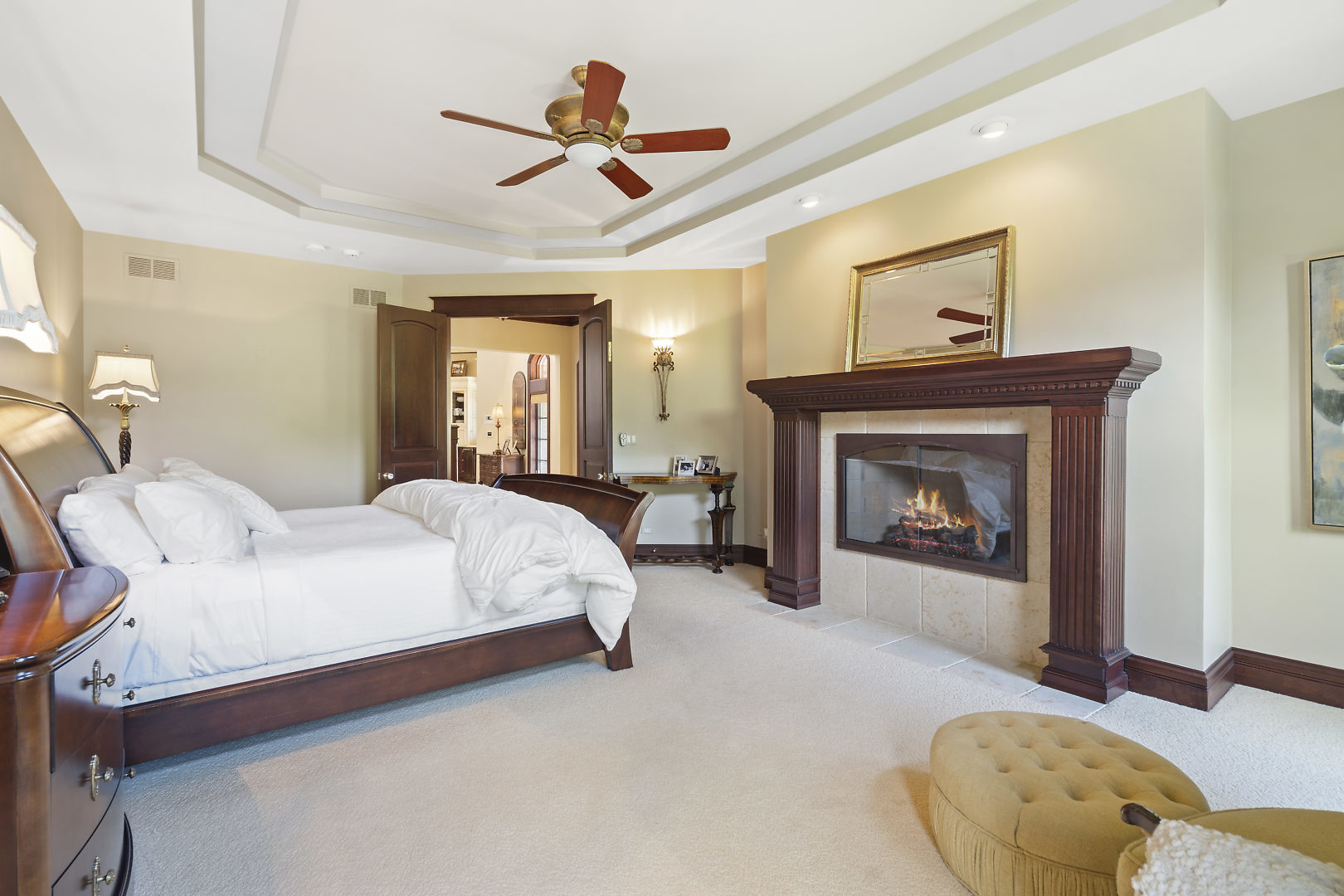 33W571 White Thorne Road St. Charles, IL 60174 - Photo 8 of 46 a bed room with a bed and a fireplace