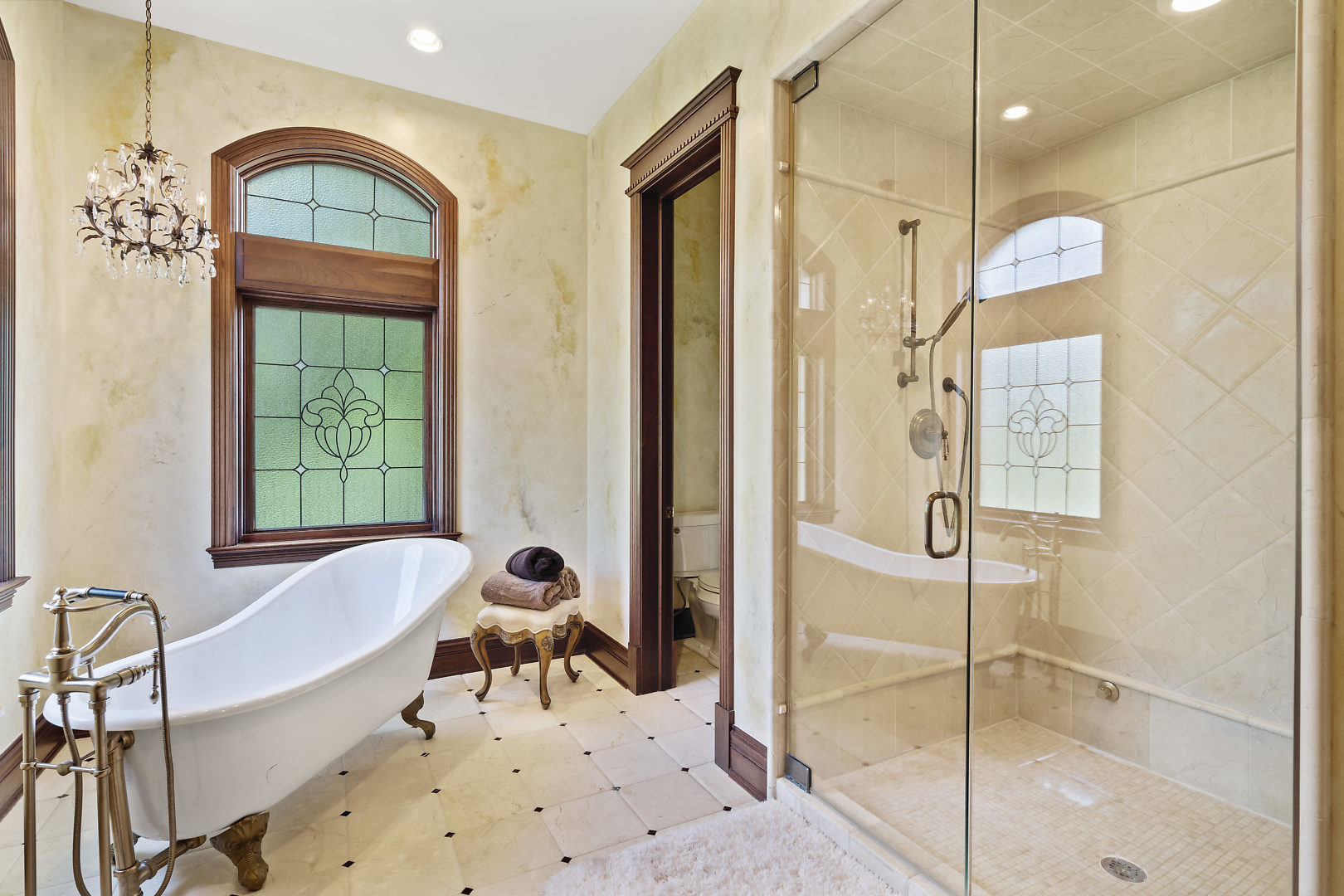 33W571 White Thorne Road St. Charles, IL 60174 - Photo 10 of 46 a bathroom with a tub and a window