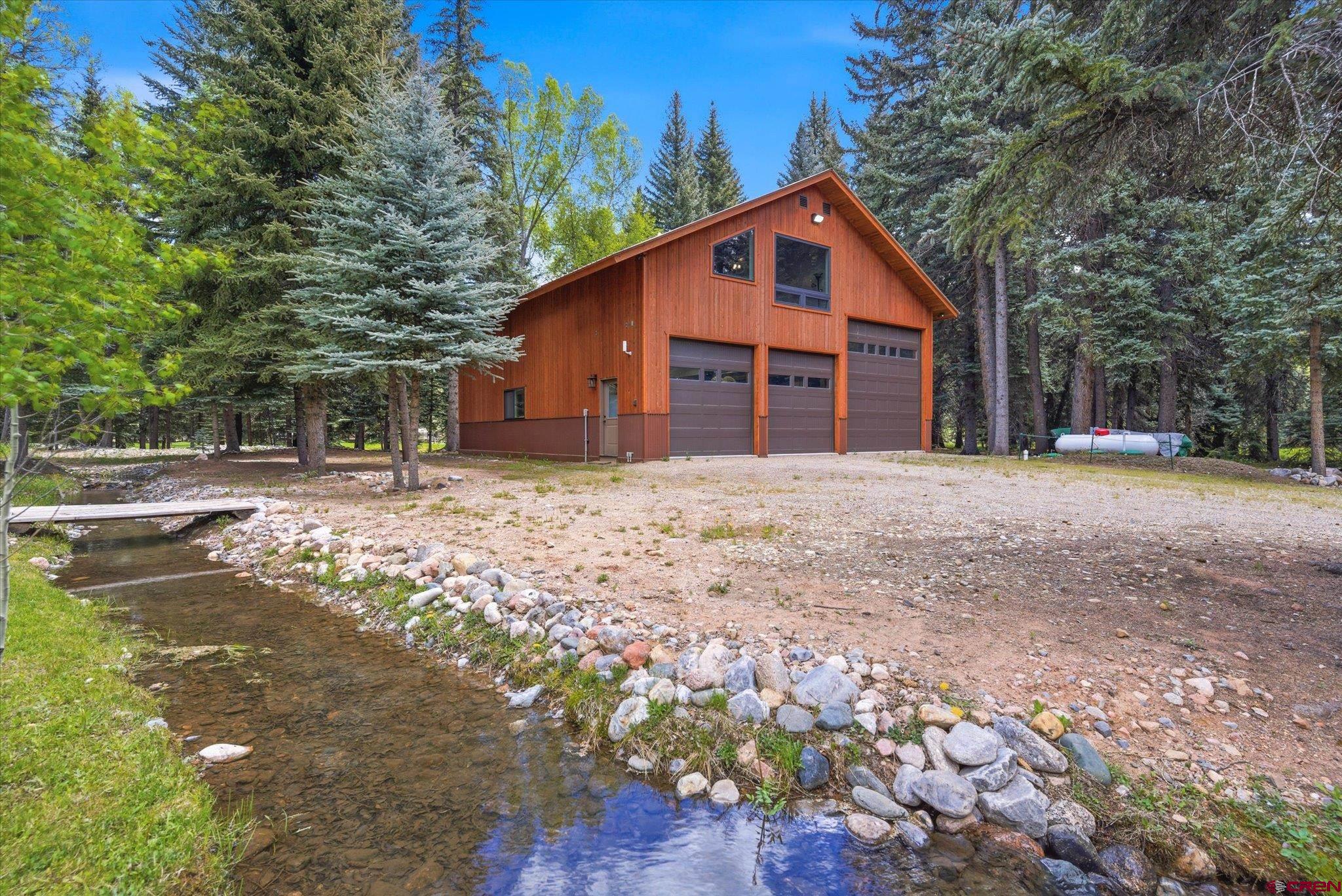 197 Hummingbird Way Bayfield, CO 81122 - Photo 28 of 44 a view of a house with a yard