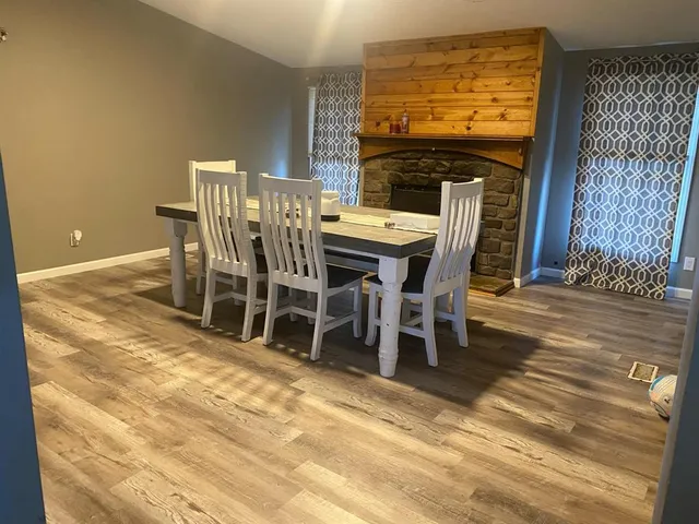 a view of a dining room with furniture