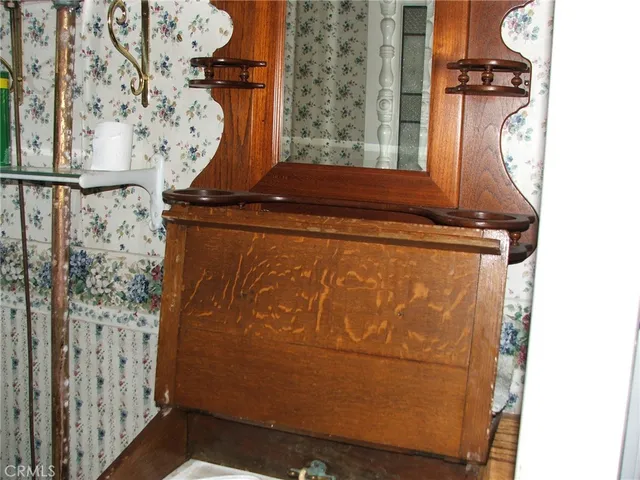 a view of door with wooden door