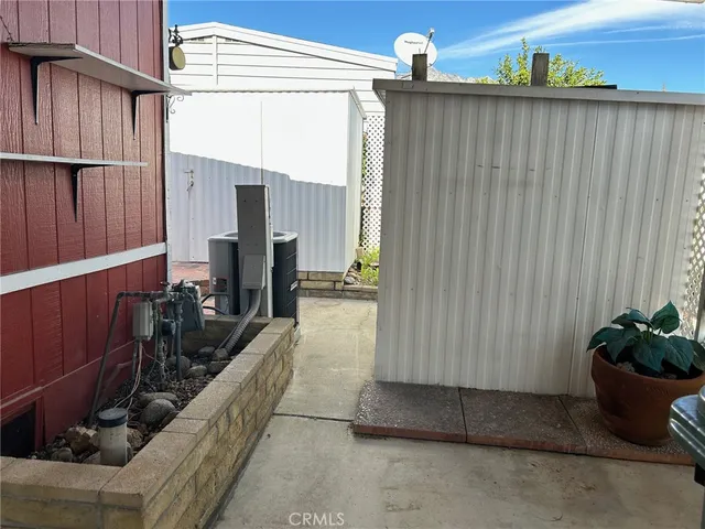a view of balcony with furniture