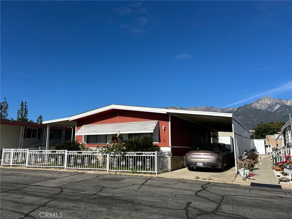 9800 Base Line Road, Unit 68 Rancho Cucamonga, CA 91701 - Photo 22 of 22 a front view of house with yard