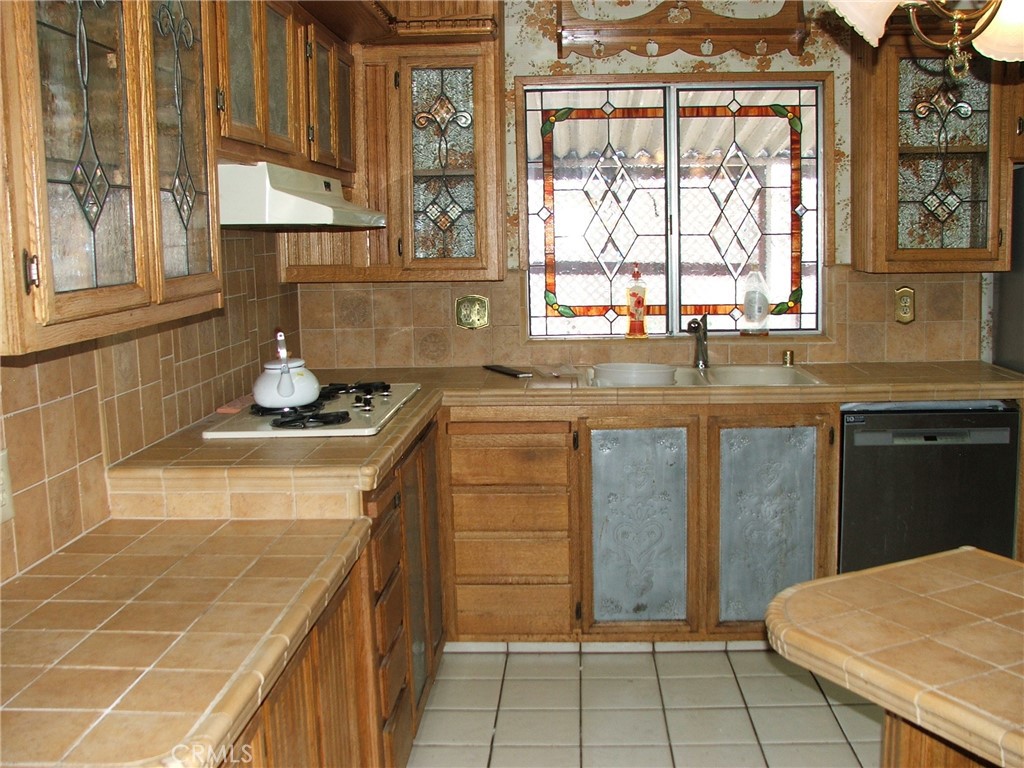 9800 Base Line Road, Unit 68 Rancho Cucamonga, CA 91701 - Photo 5 of 22 a kitchen with a sink and cabinets