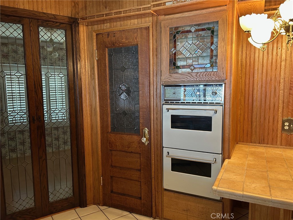 9800 Base Line Road, Unit 68 Rancho Cucamonga, CA 91701 - Photo 9 of 22 a kitchen with a stove and a microwave