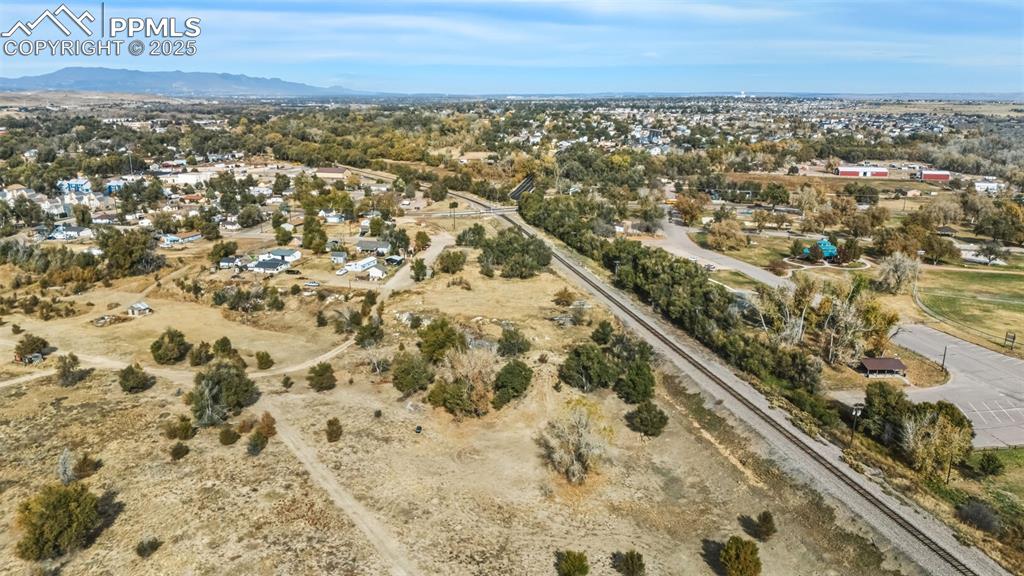 204 South Reed Street Fountain, CO 80817 - Photo 6 of 13 Aerial view of property's location with a mountain backdrop