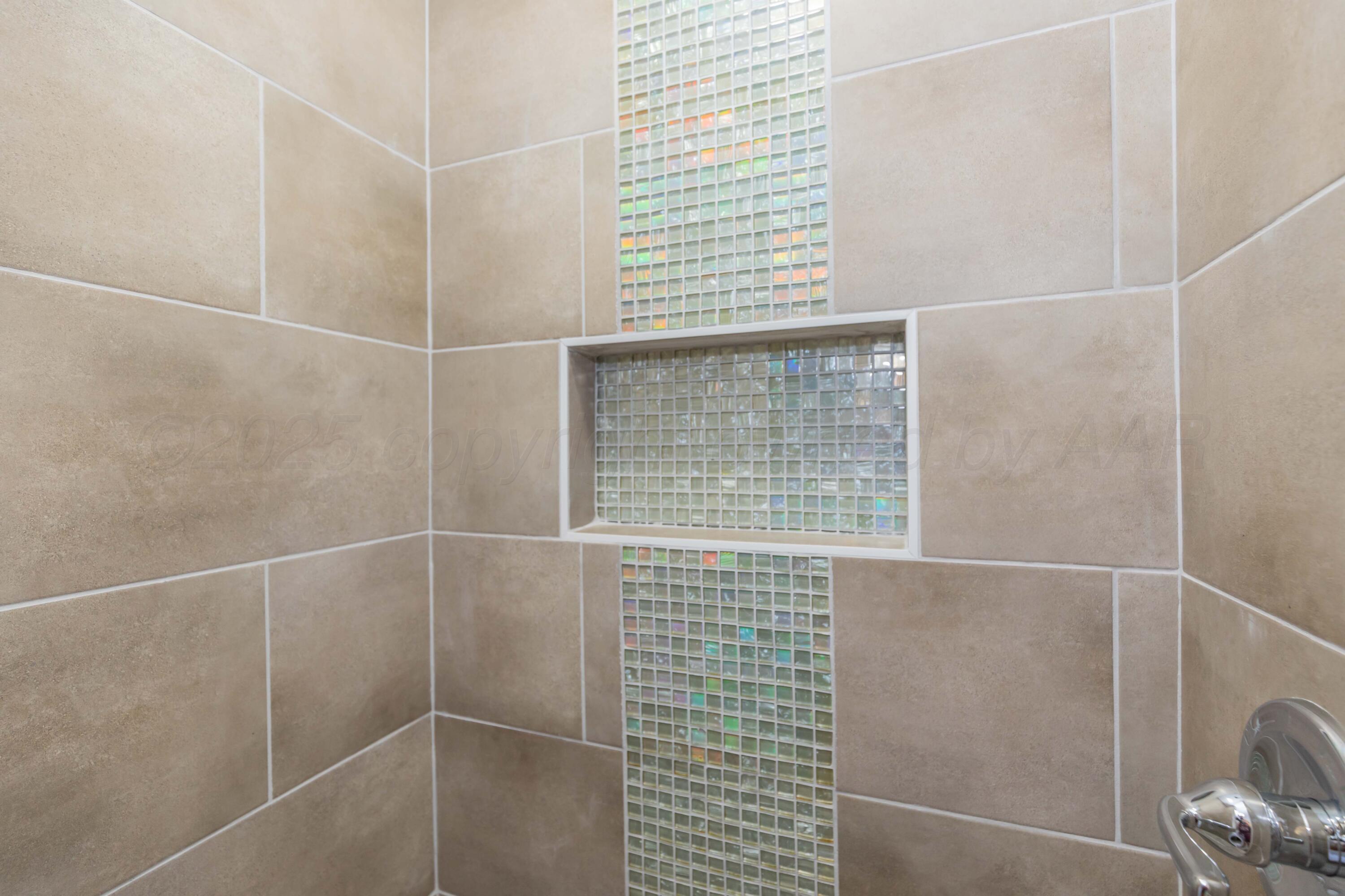 7912 Gerald Drive Amarillo, TX 79121 - Photo 24 of 45 a bathroom with a shower