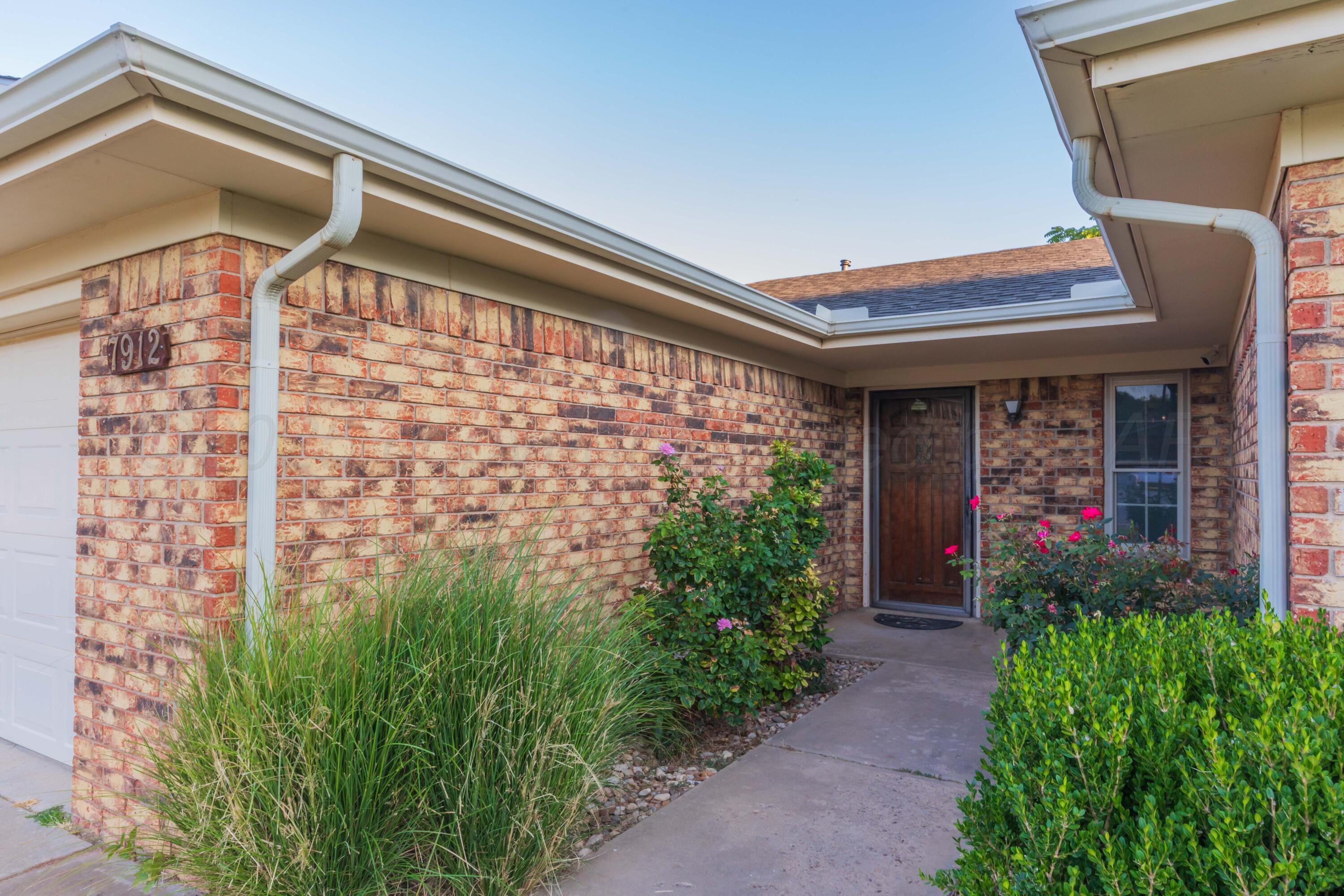 7912 Gerald Drive Amarillo, TX 79121 - Photo 3 of 45 a view of a porch with a yard