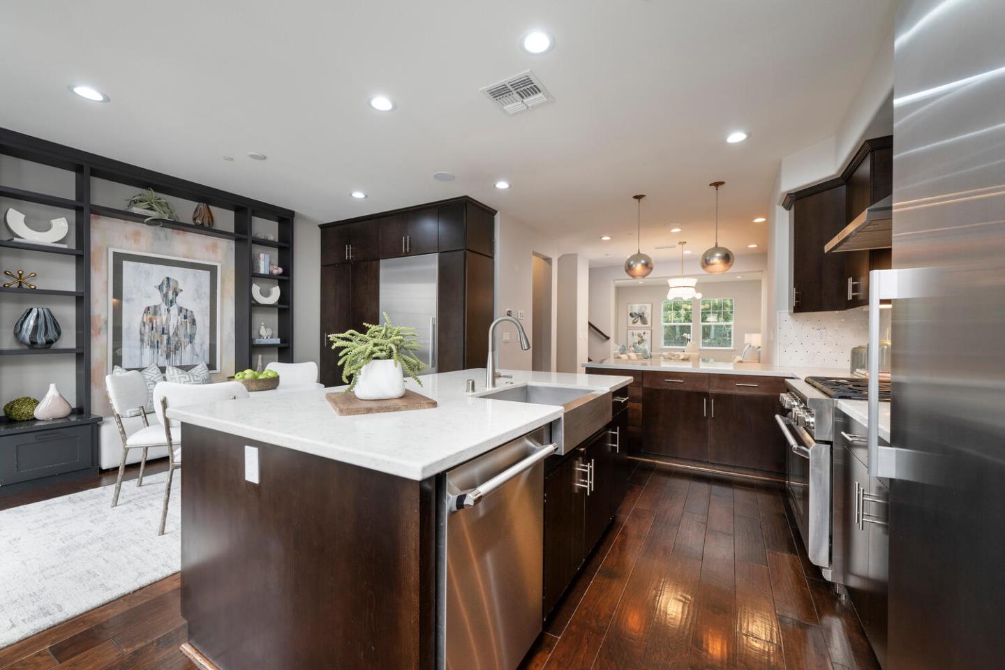 2903 Baze Road San Mateo, CA 94403 - Photo 12 of 31 a kitchen with a sink appliances wooden floor and a counter top space