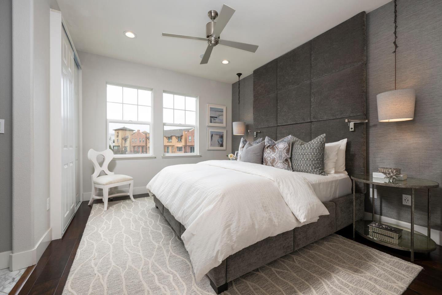 2903 Baze Road San Mateo, CA 94403 - Photo 16 of 31 a bedroom with a large bed and a chandelier