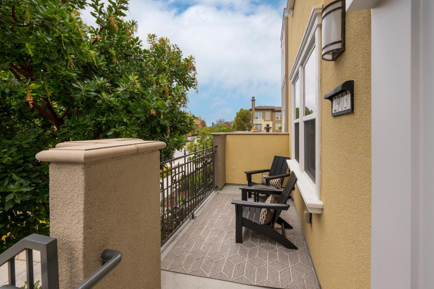 2903 Baze Road San Mateo, CA 94403 - Photo 3 of 31 a balcony with table and chairs