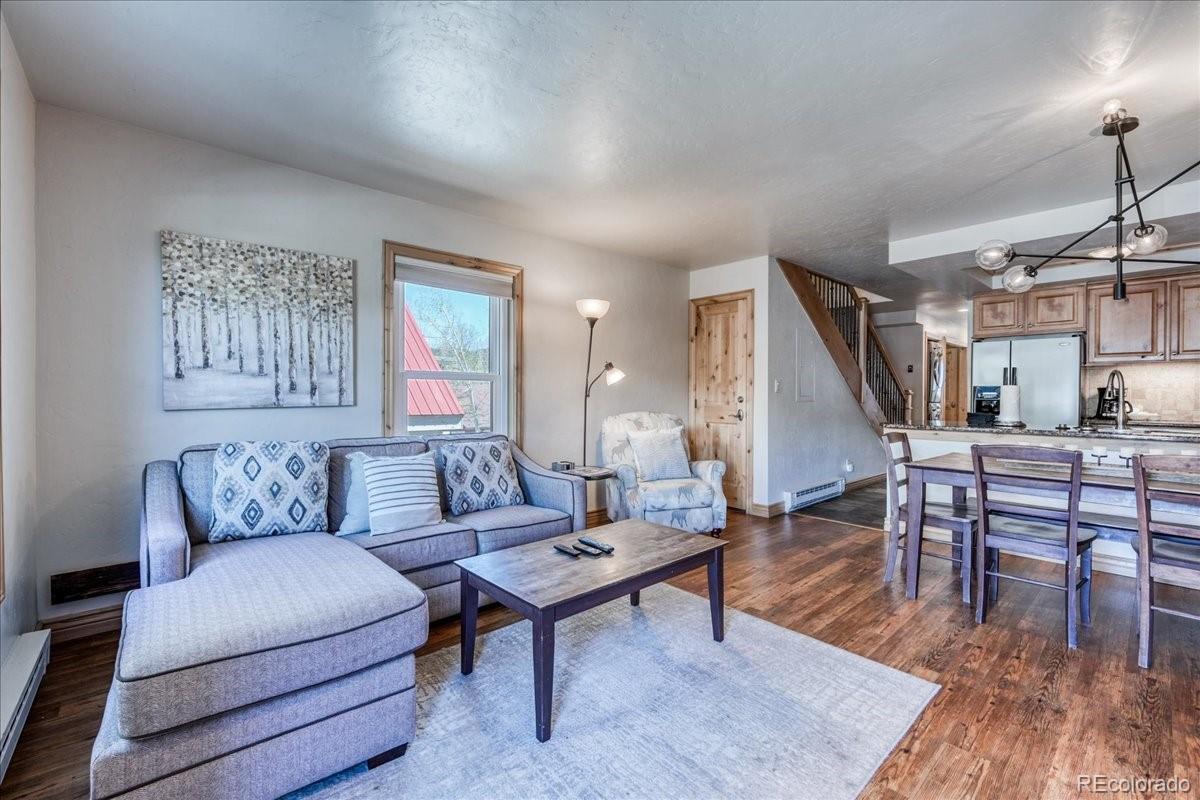200 North Ridge Street, Unit R1 Breckenridge, CO 80424 - Photo 14 of 27 a living room with furniture and wooden floor