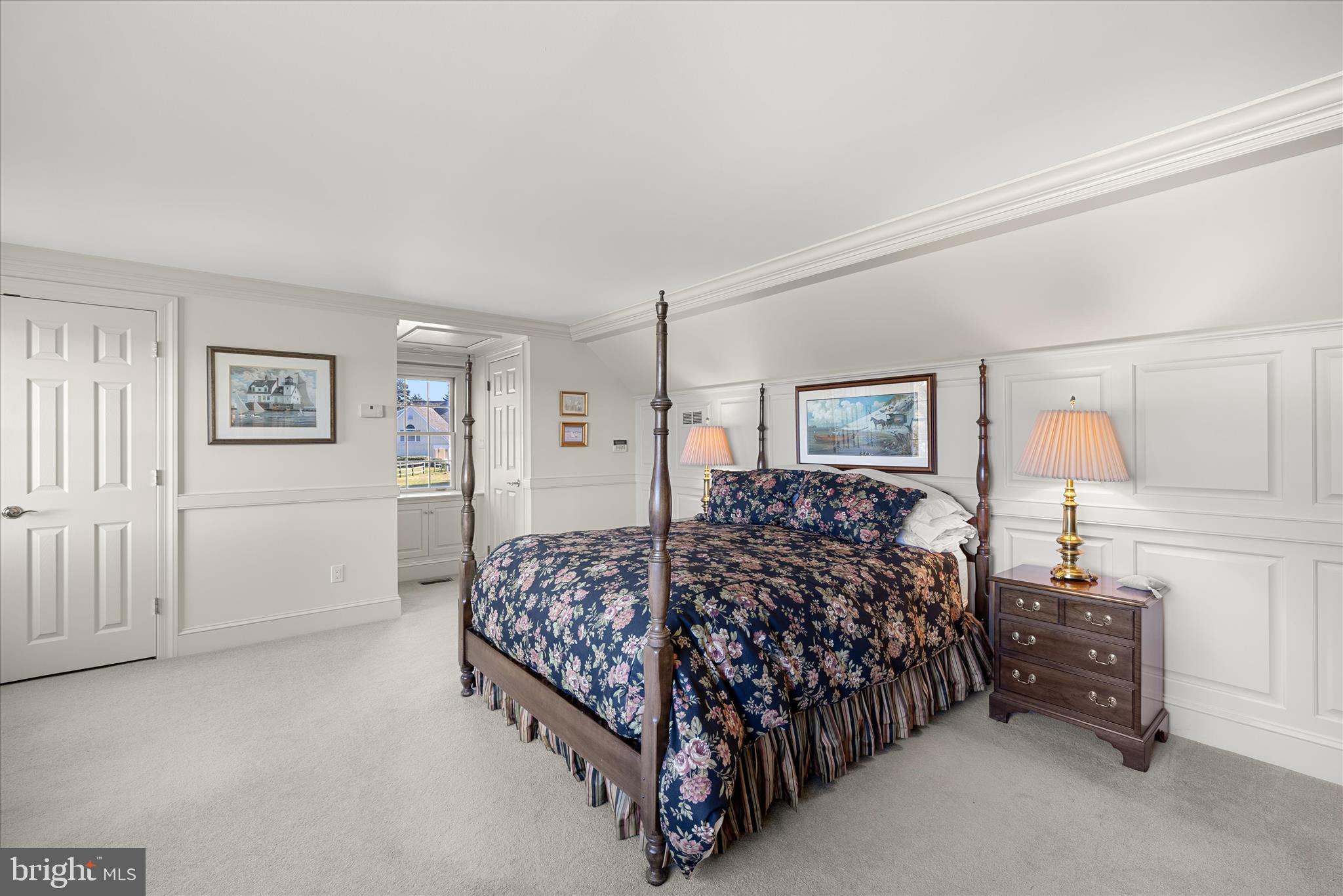27473 Westpoint Road Easton, MD 21601 - Photo 22 of 58 a bed room with a bed and a lamp