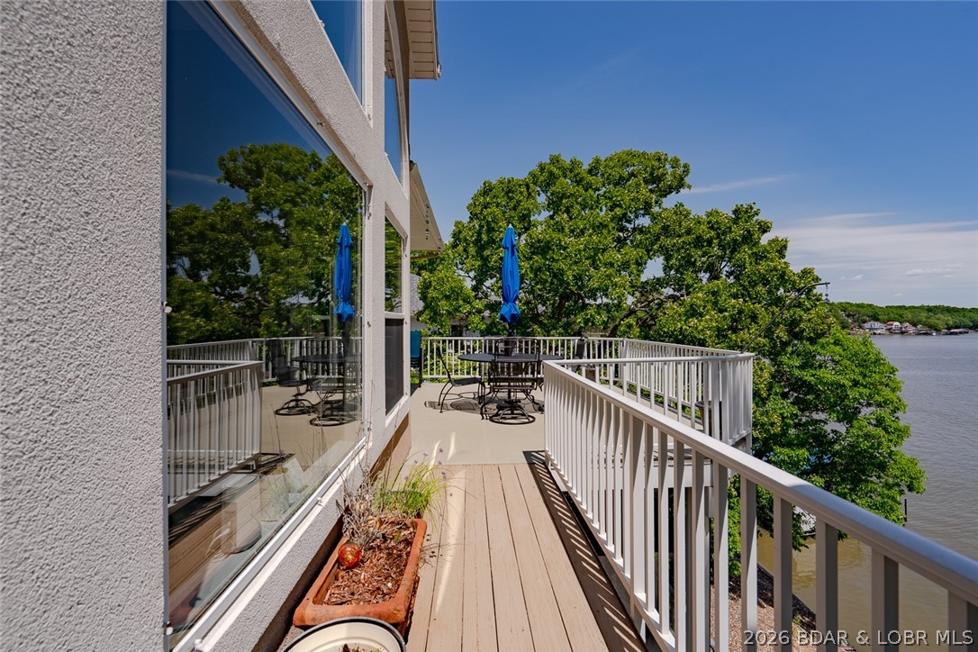 150 Cub Cove Point Camdenton, MO 65020 - Photo 34 of 89 Deck looking over to open area in front of main su