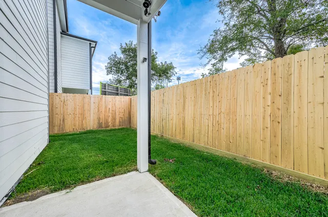 a view of a backyard with garden