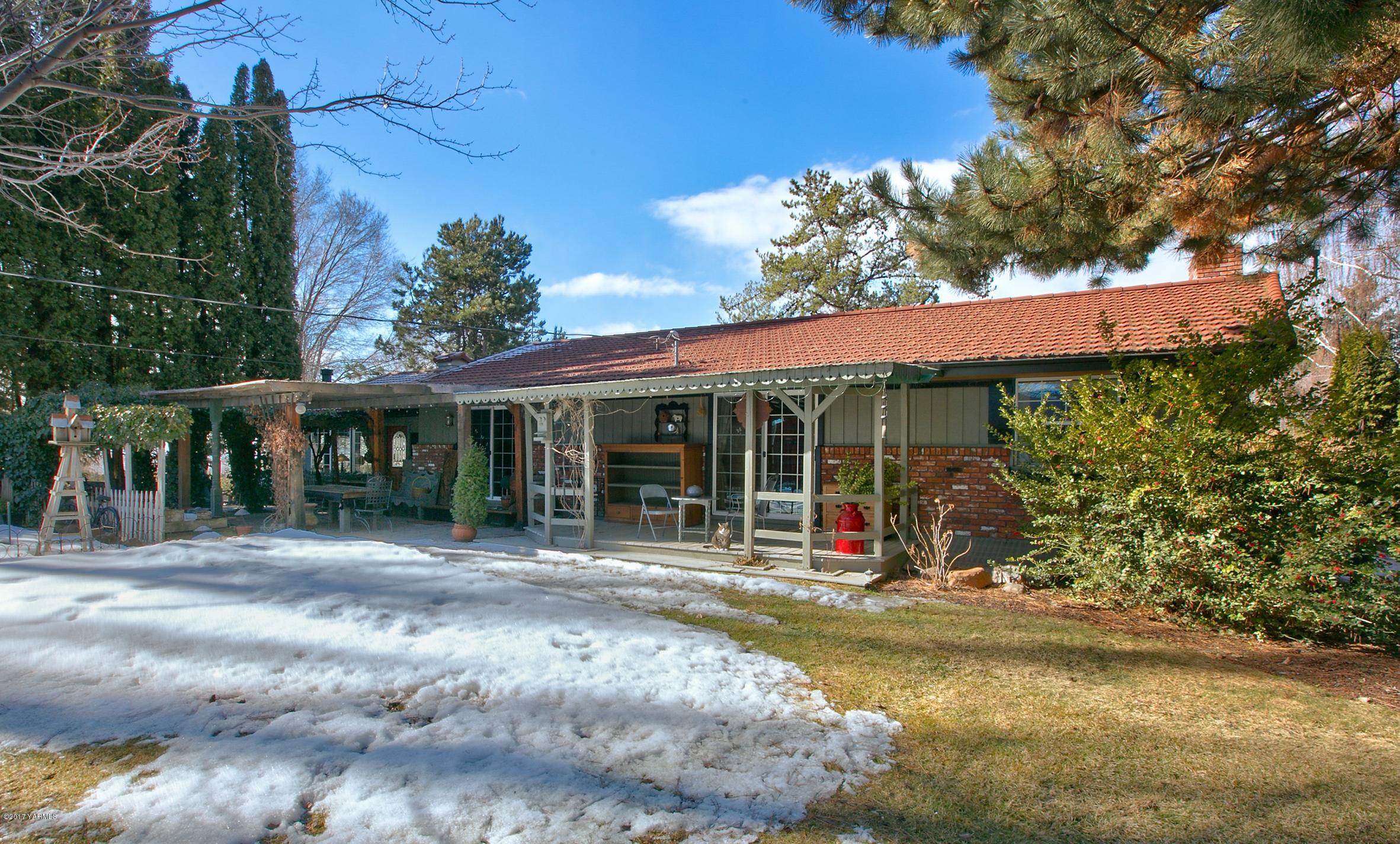 7503 Bittner Road Yakima, WA 98901 - Photo 1 of 31 a front view of a house having patio