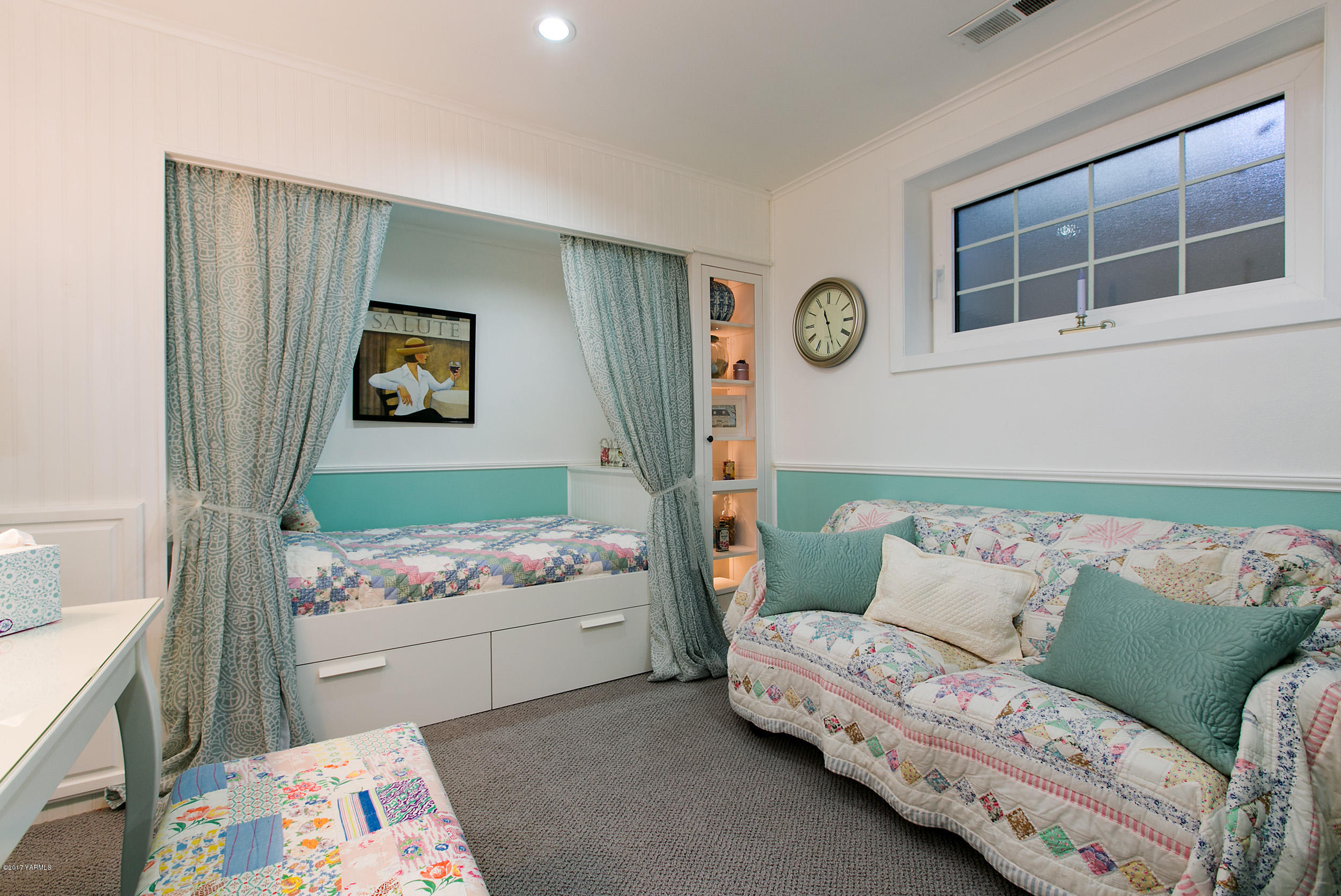 7503 Bittner Road Yakima, WA 98901 - Photo 16 of 31 a bedroom with a bed and a window