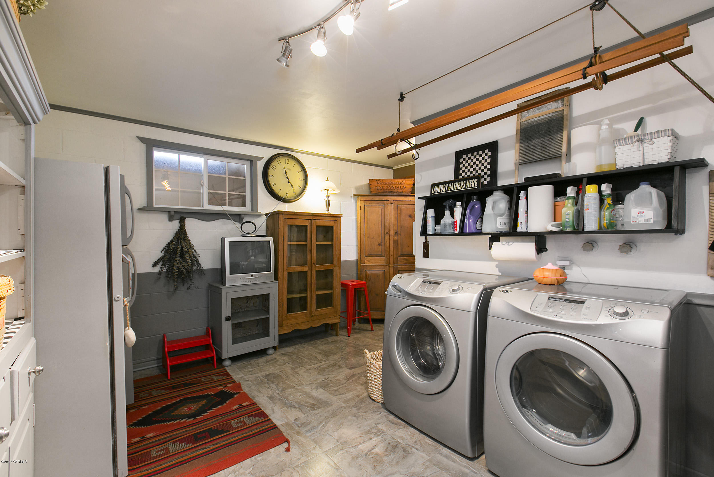 7503 Bittner Road Yakima, WA 98901 - Photo 20 of 31 a view of a storage & utility room with washer and dryer