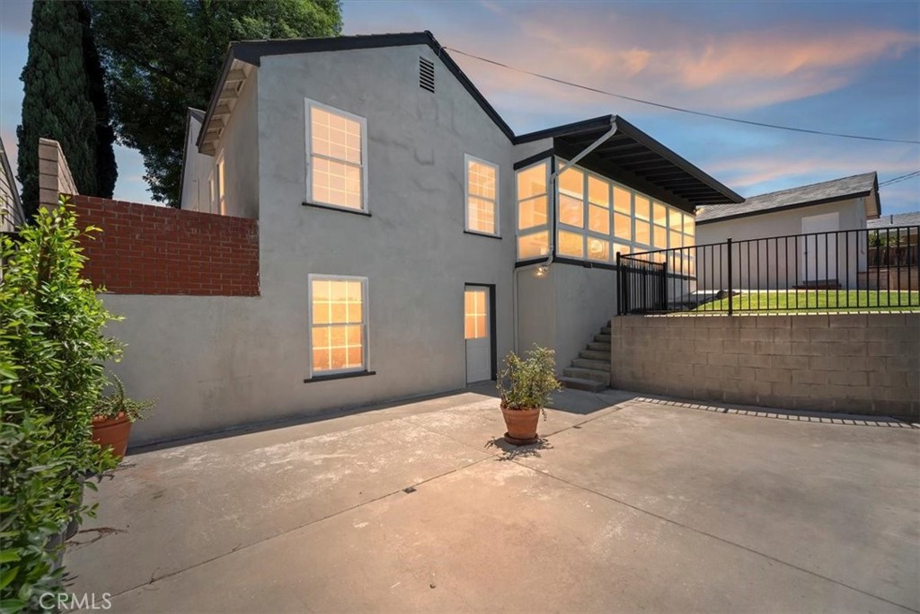 1748 Prince Albert Drive Riverside, CA 92507 - Photo 32 of 42 a front view of a house with a yard