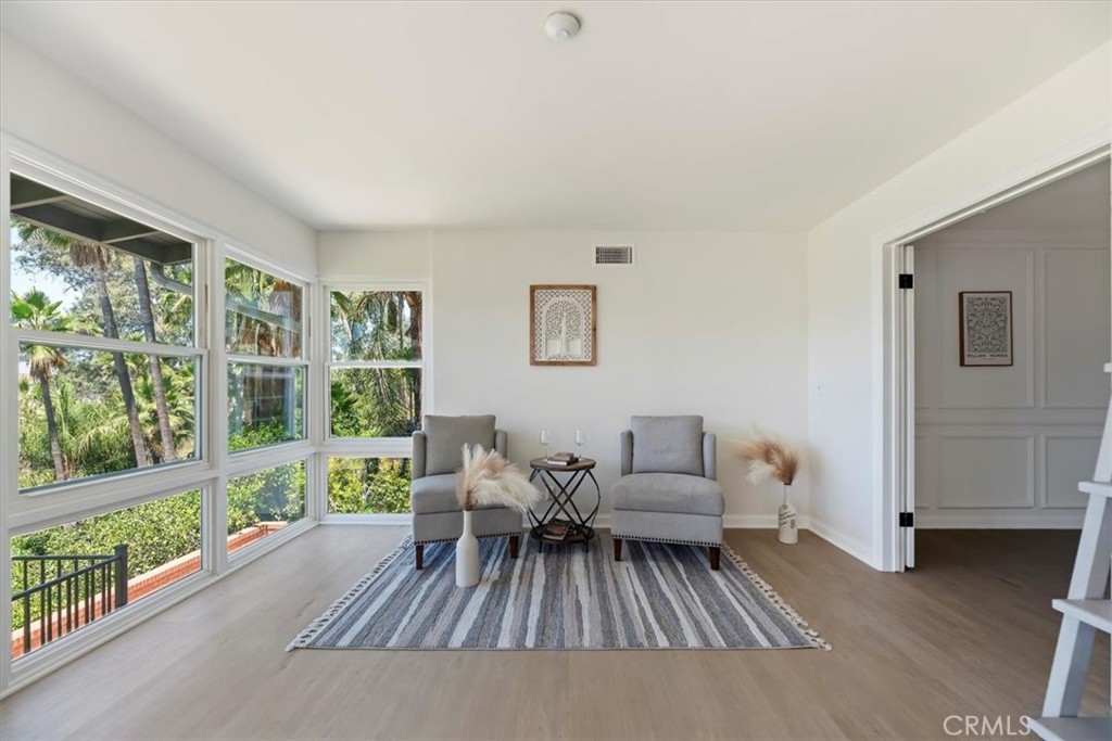 1748 Prince Albert Drive Riverside, CA 92507 - Photo 10 of 42 a living room with furniture and a large window