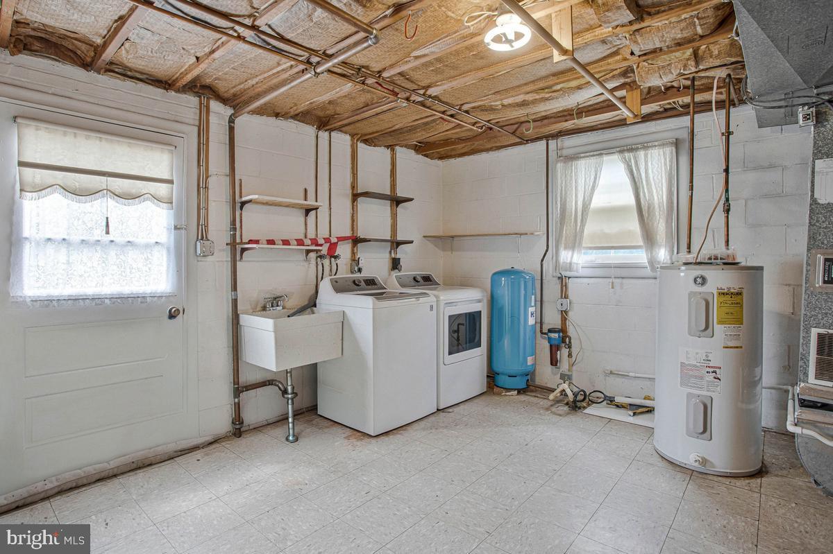 10700 Ward Road Dunkirk, MD 20754 - Photo 28 of 38 Laundry room and storage
