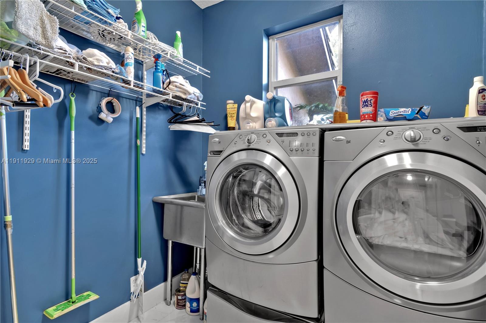 15841 Southwest 61st Street, Unit 15841 Davie, FL 33331 - Photo 34 of 49 a utility room with dryer and washer