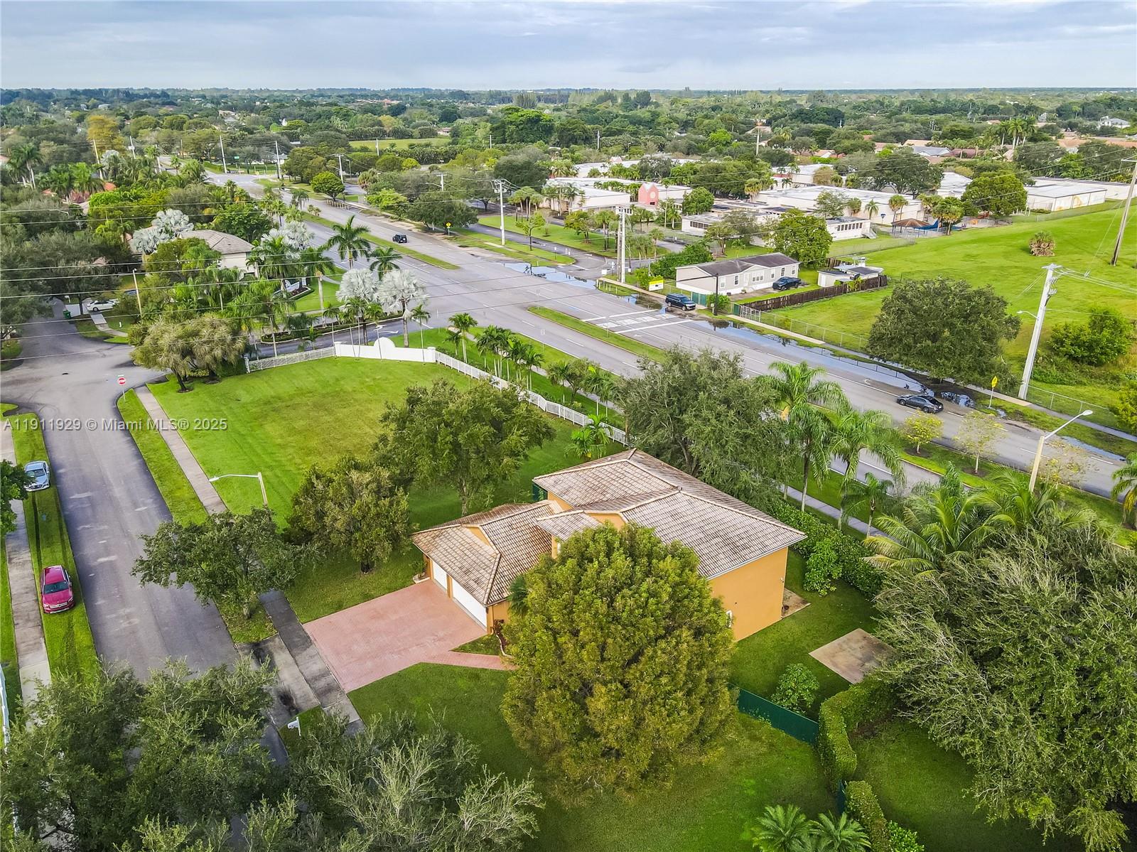 15841 Southwest 61st Street, Unit 15841 Davie, FL 33331 - Photo 36 of 49 an aerial view of residential houses with outdoor space and trees