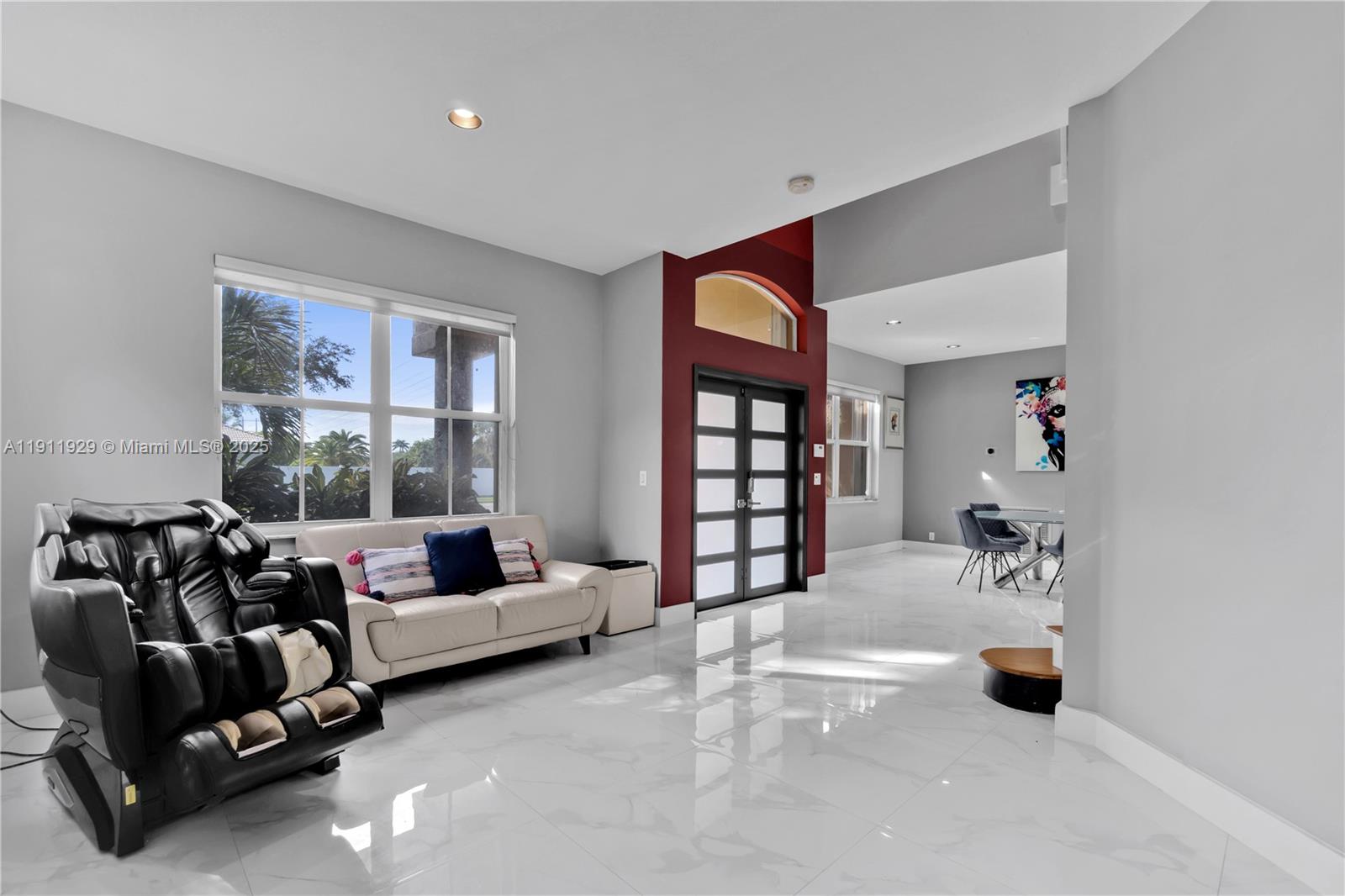 15841 Southwest 61st Street, Unit 15841 Davie, FL 33331 - Photo 4 of 49 a living room with furniture and a window