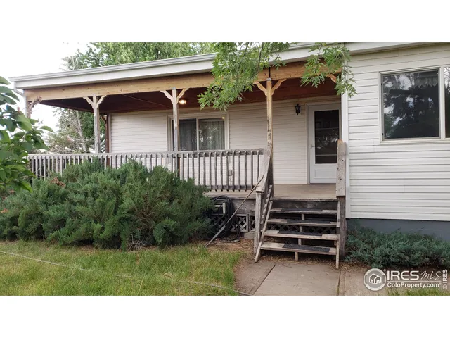 a black and white photo of a house
