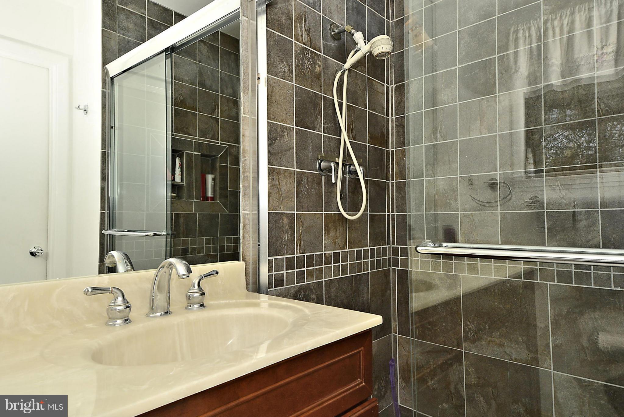 9921 Vale Road Vienna, VA 22181 - Photo 15 of 30 Remodeled bathroom