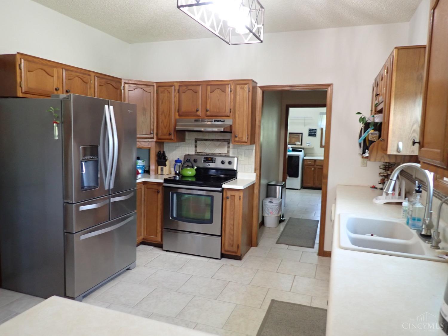 7850 Morris Road Hamilton, OH 45011 - Photo 12 of 52 Equipped Kitchen with tile floor, pantry, all appliances stay.