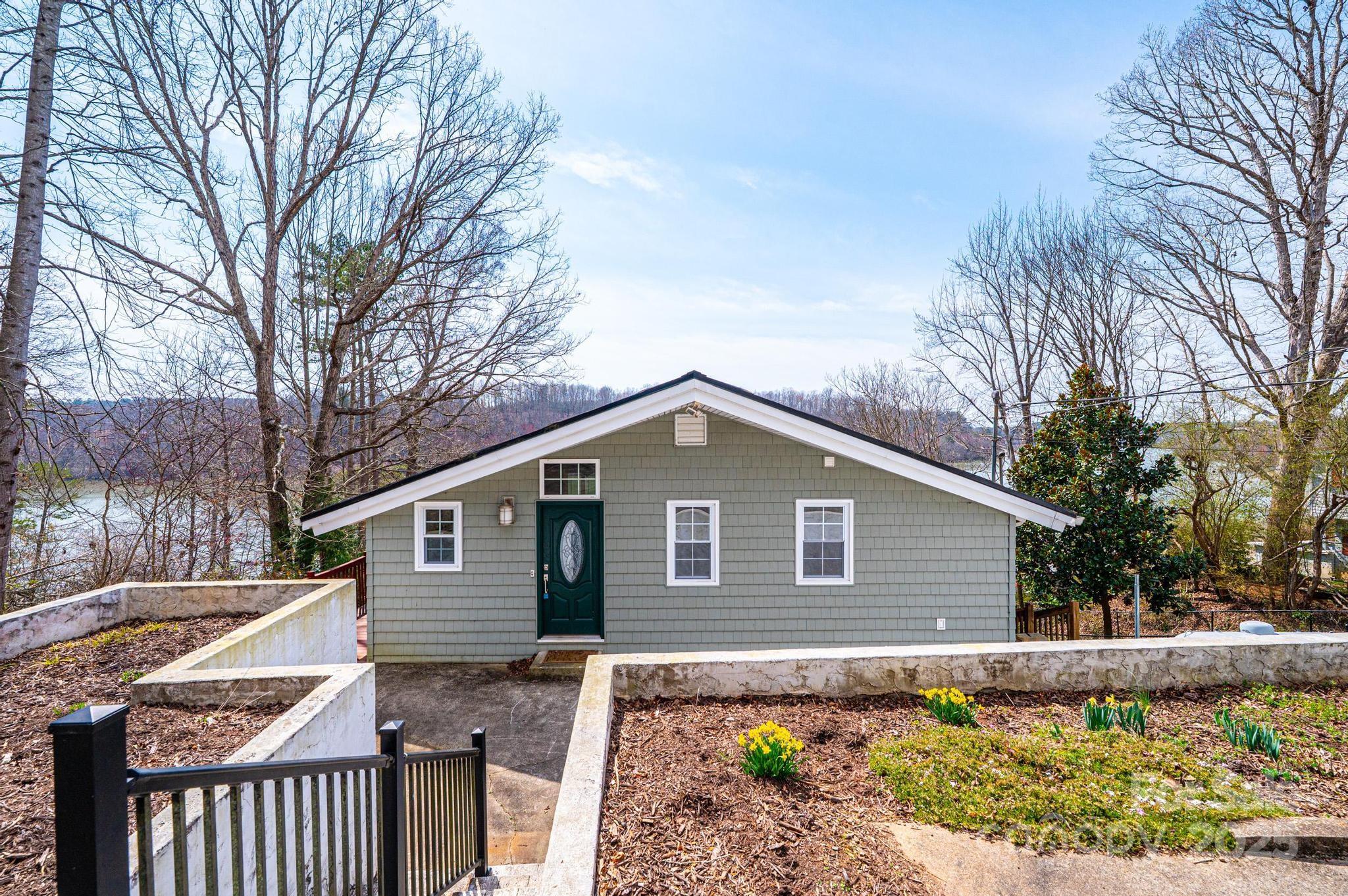 4846 Midway Sand Road Hickory, NC 28601 - Photo 2 of 48 a front view of a house with garden