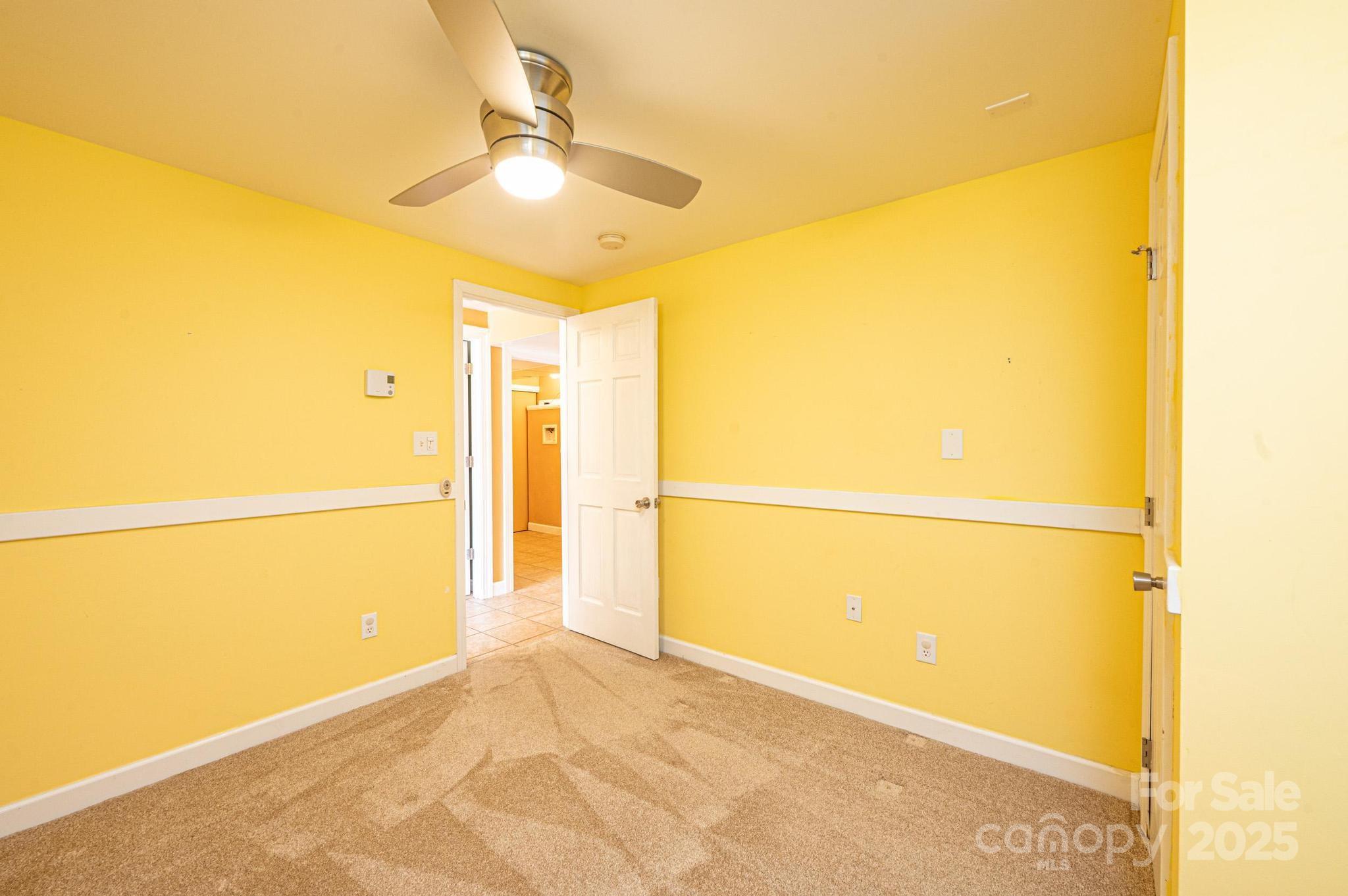 4846 Midway Sand Road Hickory, NC 28601 - Photo 23 of 48 a view of a room with a refrigerator