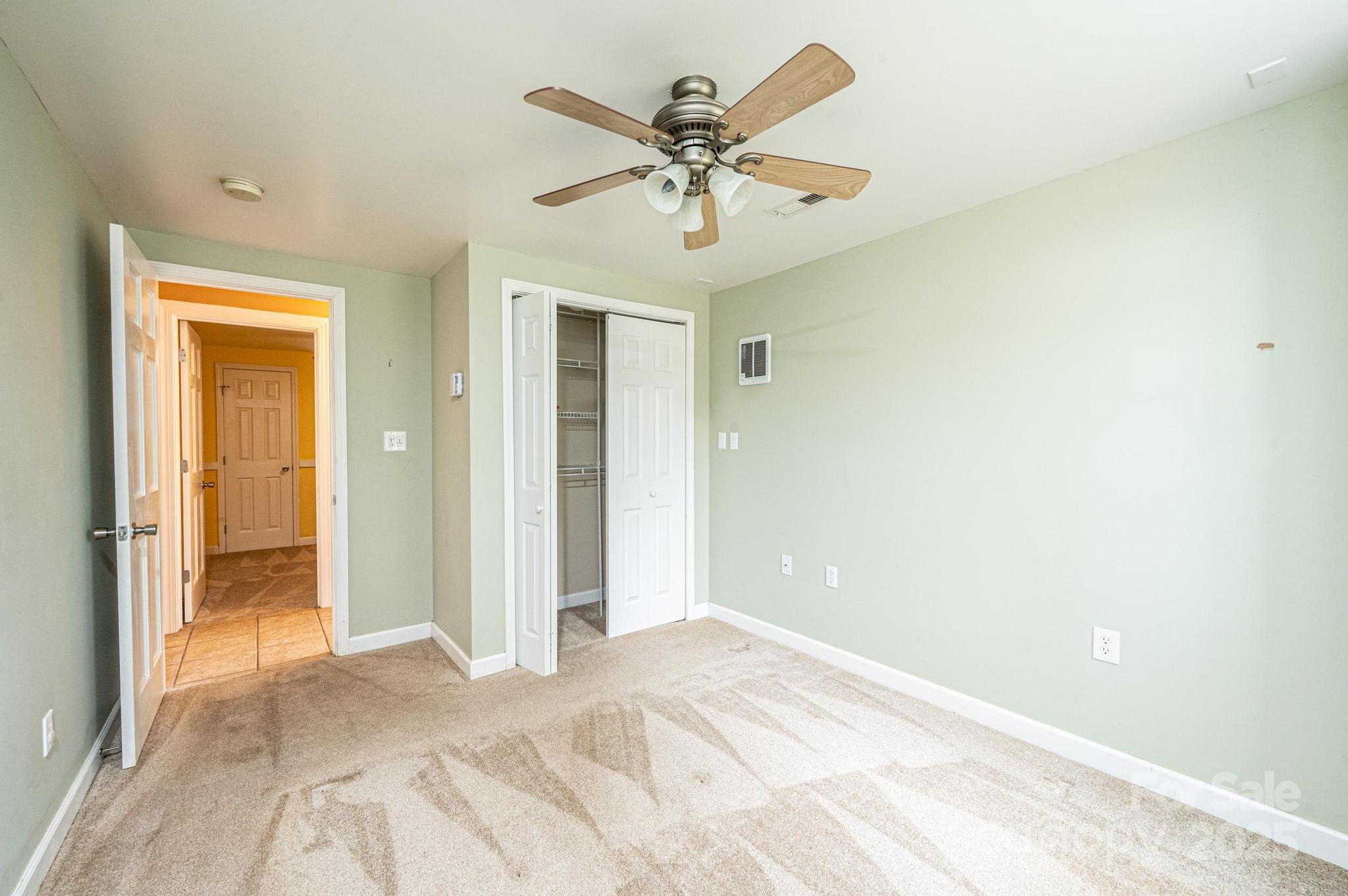 4846 Midway Sand Road Hickory, NC 28601 - Photo 24 of 48 a view of a livingroom with a ceiling fan