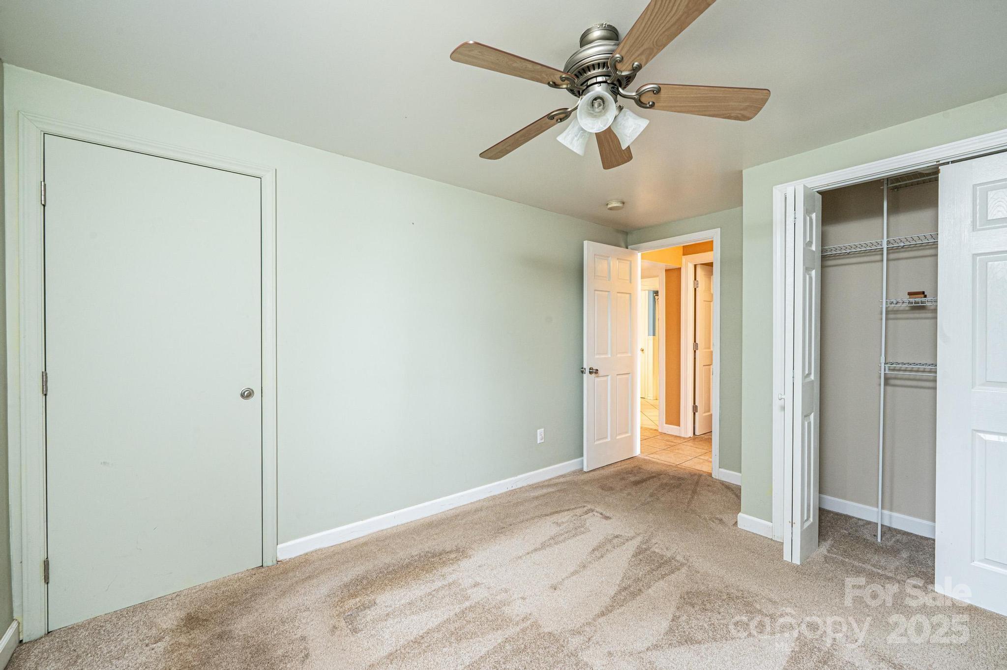 4846 Midway Sand Road Hickory, NC 28601 - Photo 26 of 48 a view of entryway and hall with a chandelier fan