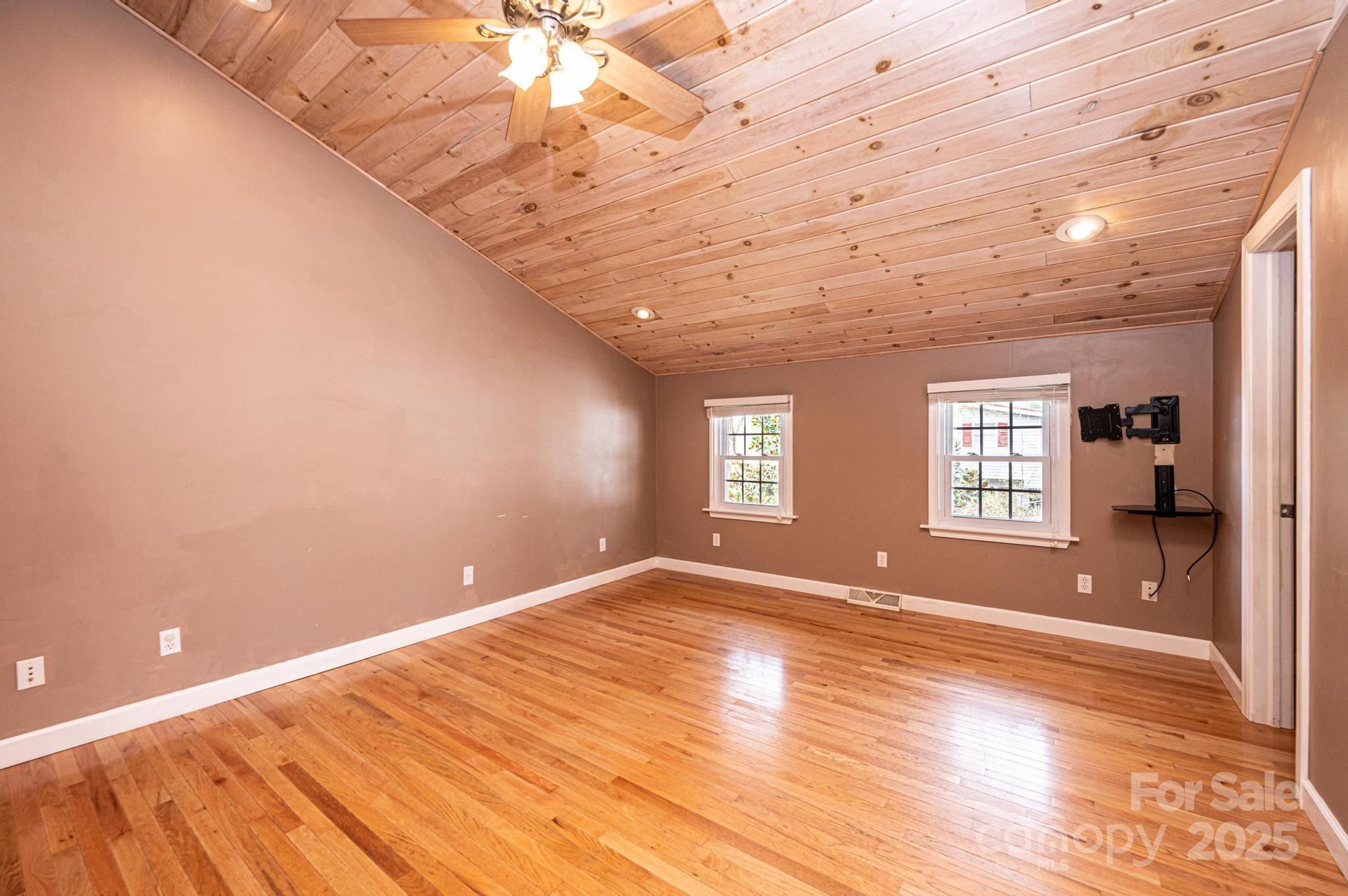 4846 Midway Sand Road Hickory, NC 28601 - Photo 31 of 48 an empty room with wooden floor and windows