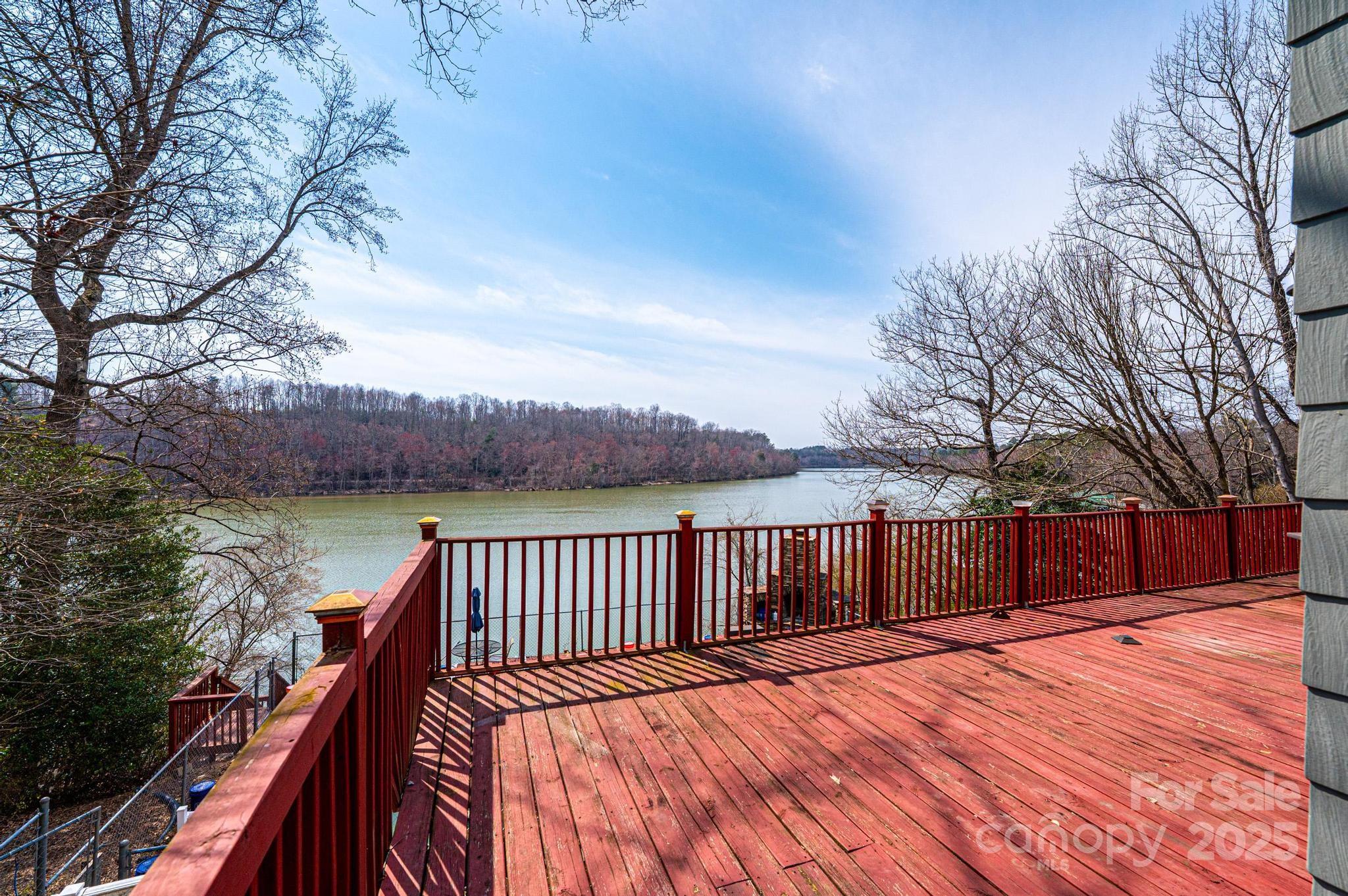 4846 Midway Sand Road Hickory, NC 28601 - Photo 45 of 48 a view of a roof deck with wooden floor and fence