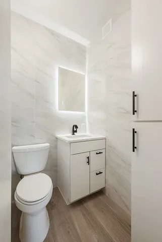 a bed room with a bed and a window