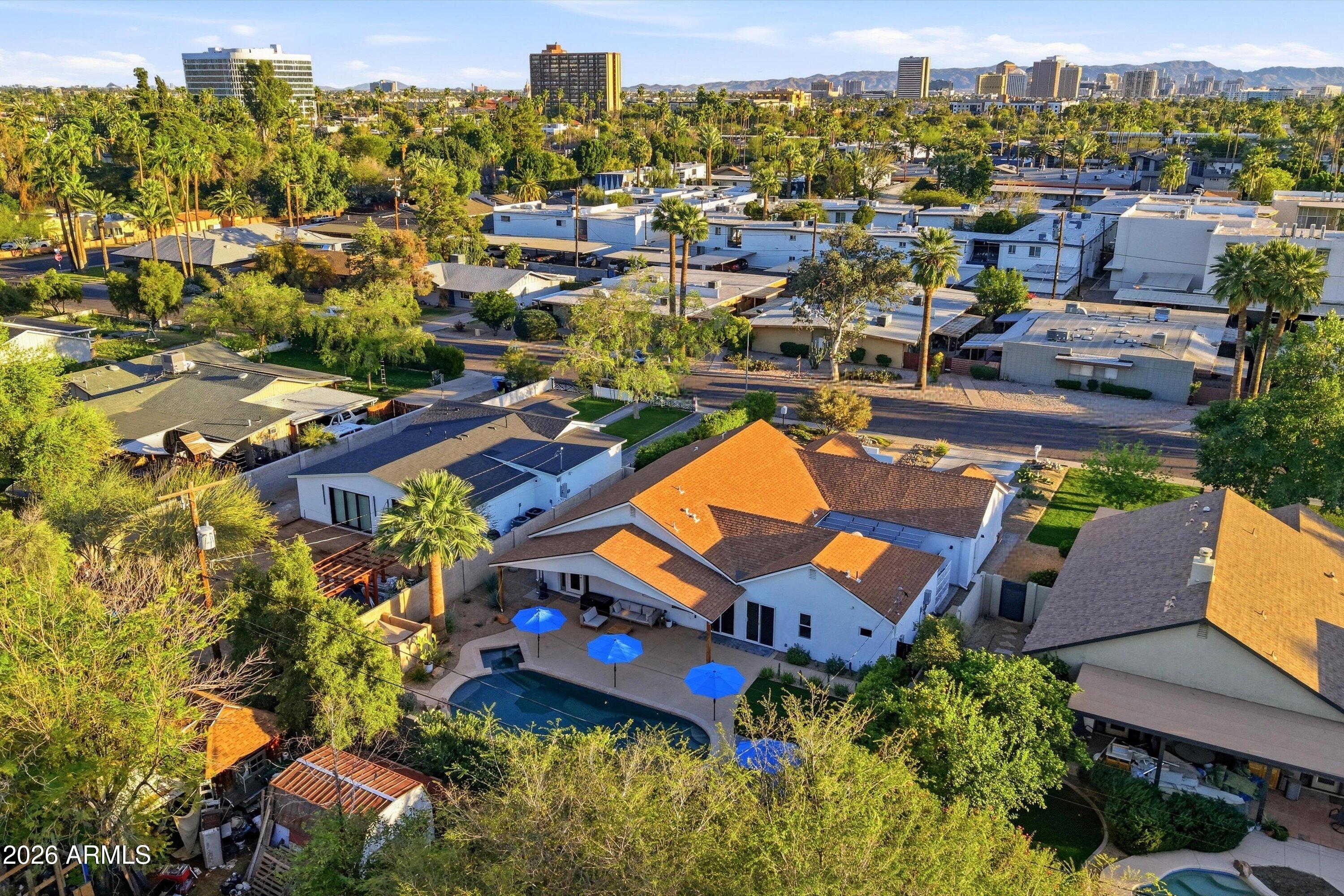 406 West Colter Street Phoenix, AZ 85013 - Photo 47 of 50 an aerial view of a house with a swimming pool yard and outdoor seating