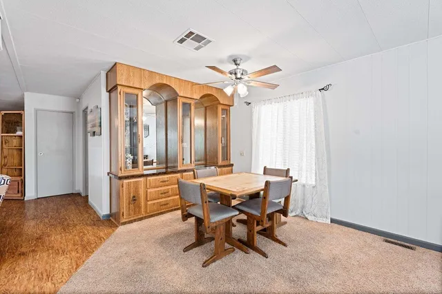 a view of a dining room with furniture