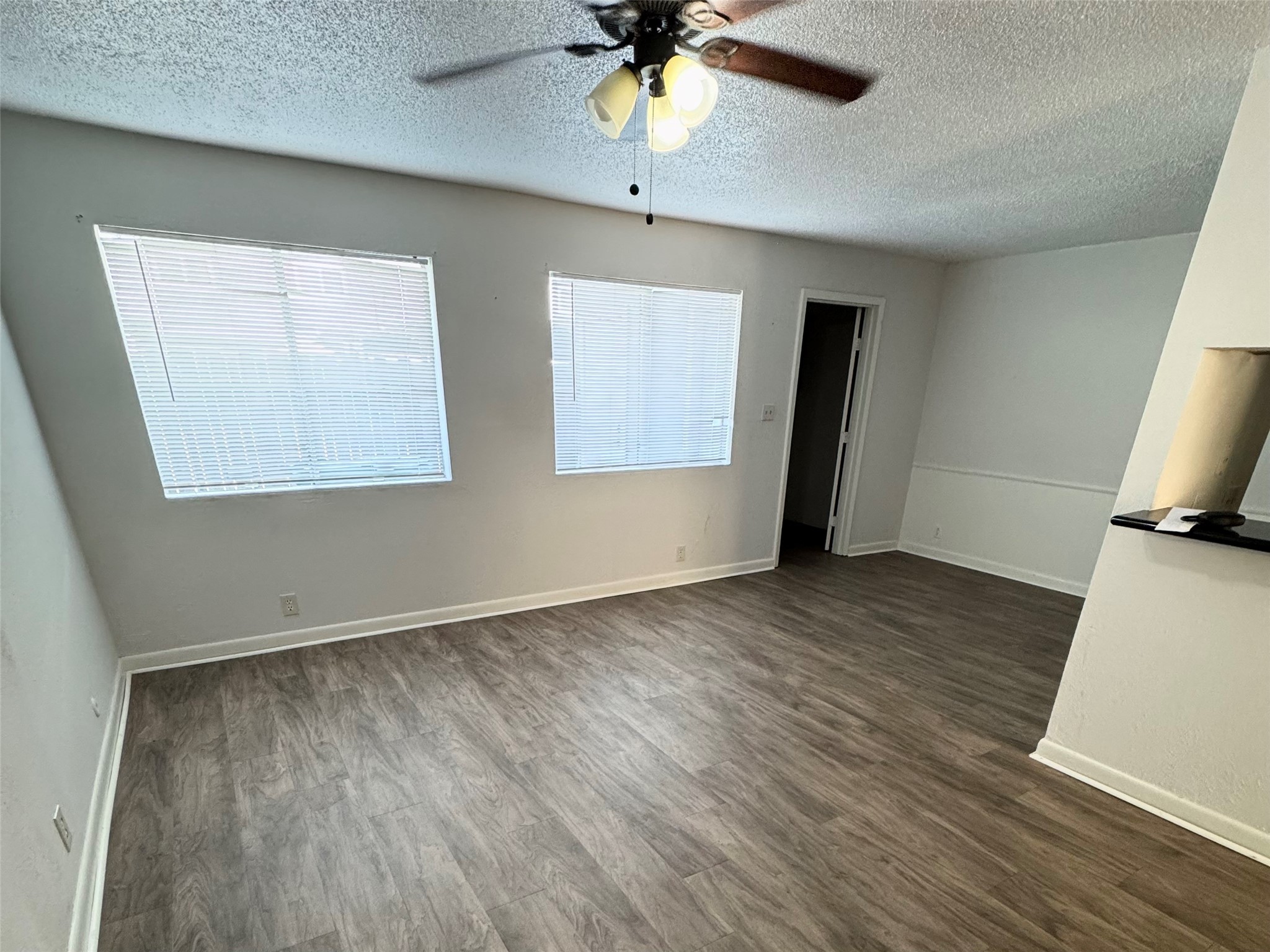 11002 Hammerly Boulevard, Unit 216 Houston, TX 77043 - Photo 6 of 16 Living room 2 open to kitchen and dining nook
