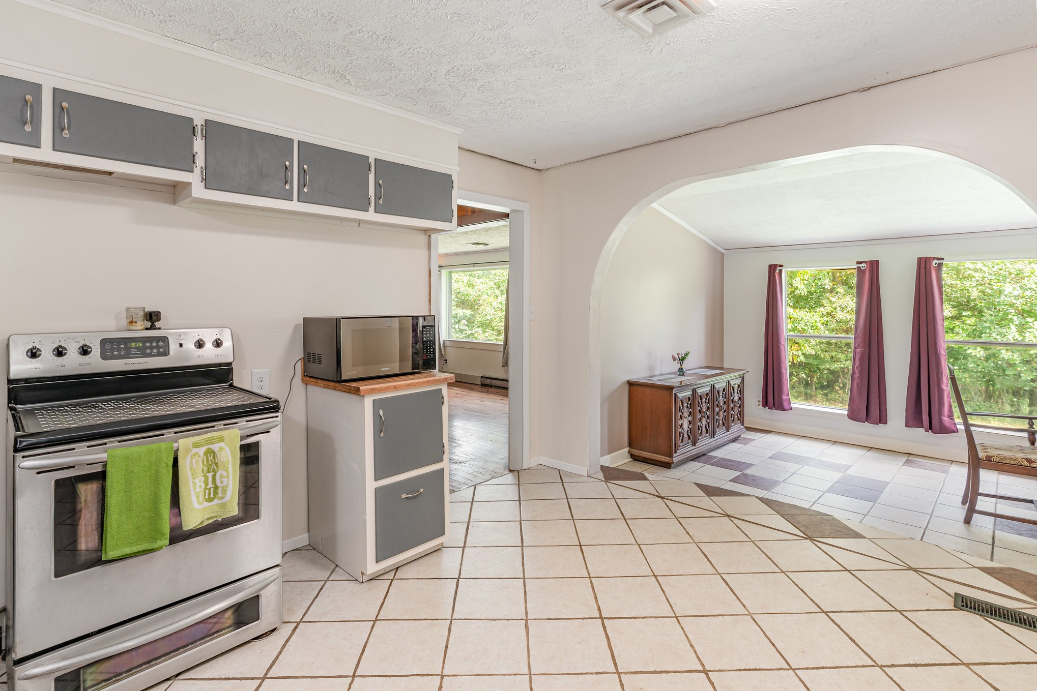 999 Stewart Road Dickson, TN 37055 - Photo 13 of 32 a kitchen with a stove and a microwave