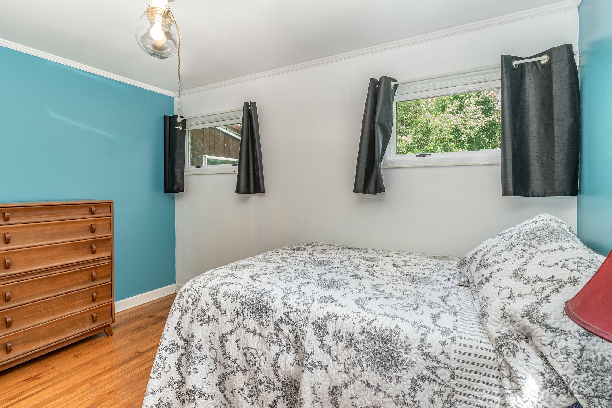 999 Stewart Road Dickson, TN 37055 - Photo 20 of 32 a bedroom with a bed and a window