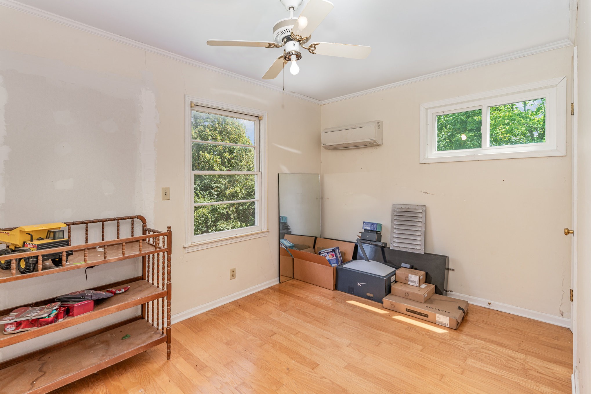999 Stewart Road Dickson, TN 37055 - Photo 24 of 32 a bedroom with furniture and a window