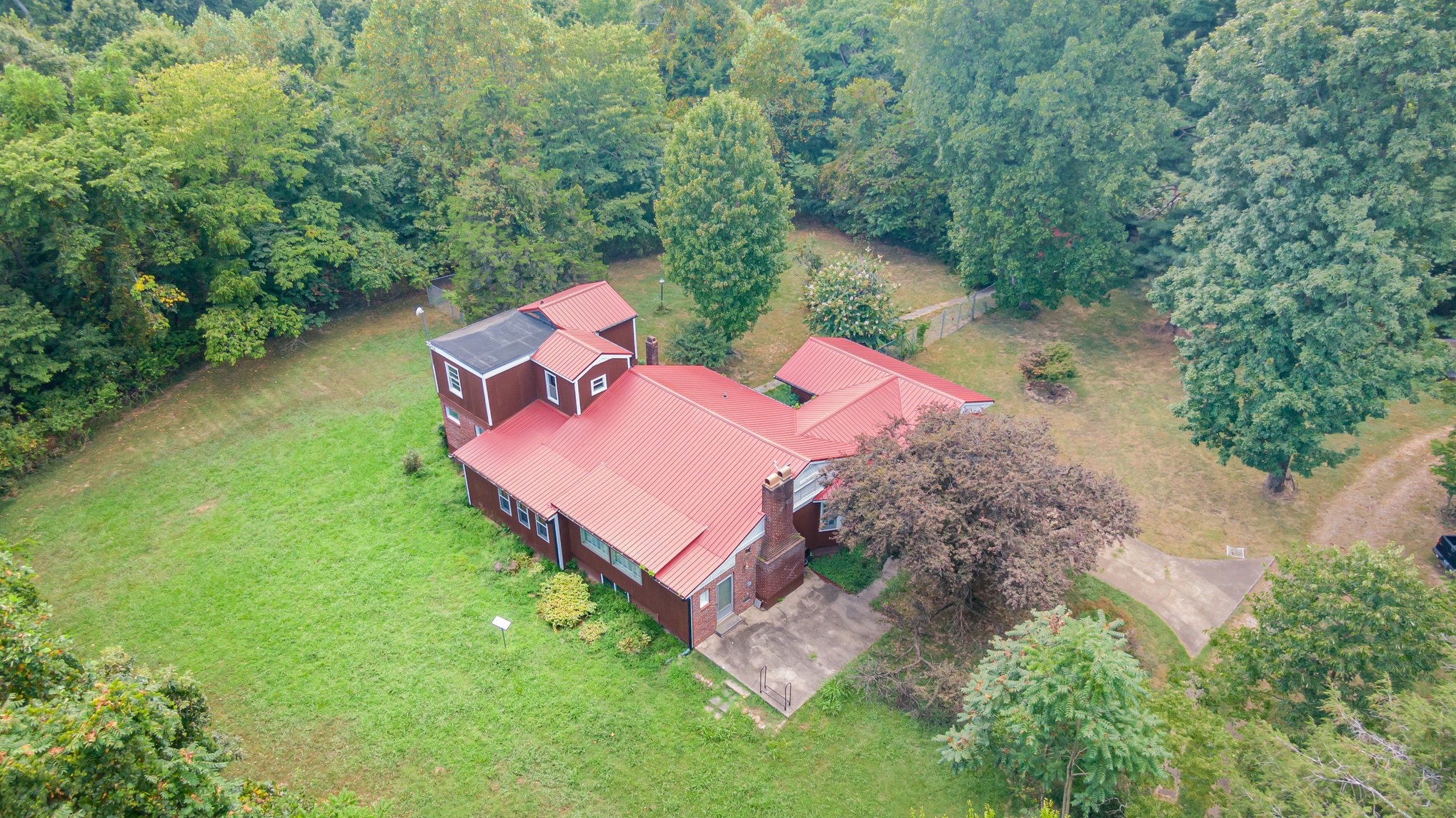999 Stewart Road Dickson, TN 37055 - Photo 3 of 32 an aerial view of a house with outdoor space