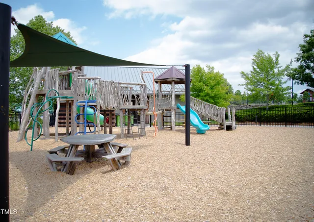 a view of a swimming pool with a lounge chair