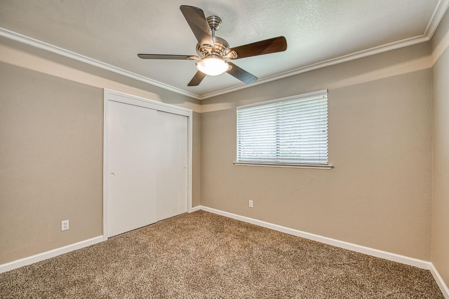 33717 River Knolls Road Coarsegold, CA 93614 - Photo 16 of 66 a view of an empty room with a window